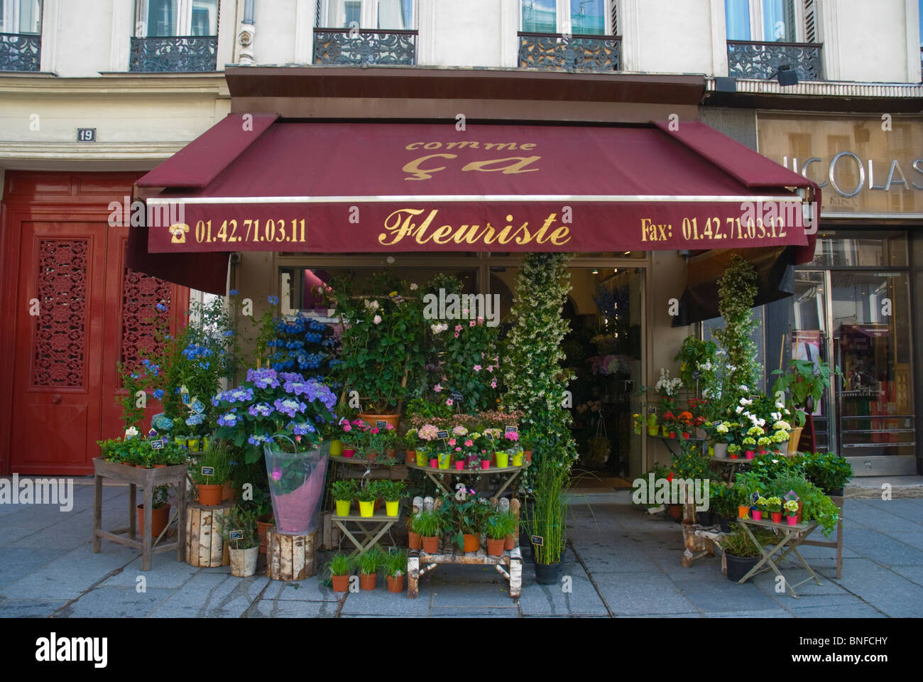 Flower shop Rue Saint Antoine Le Marais district Paris France Europe Stock Photo