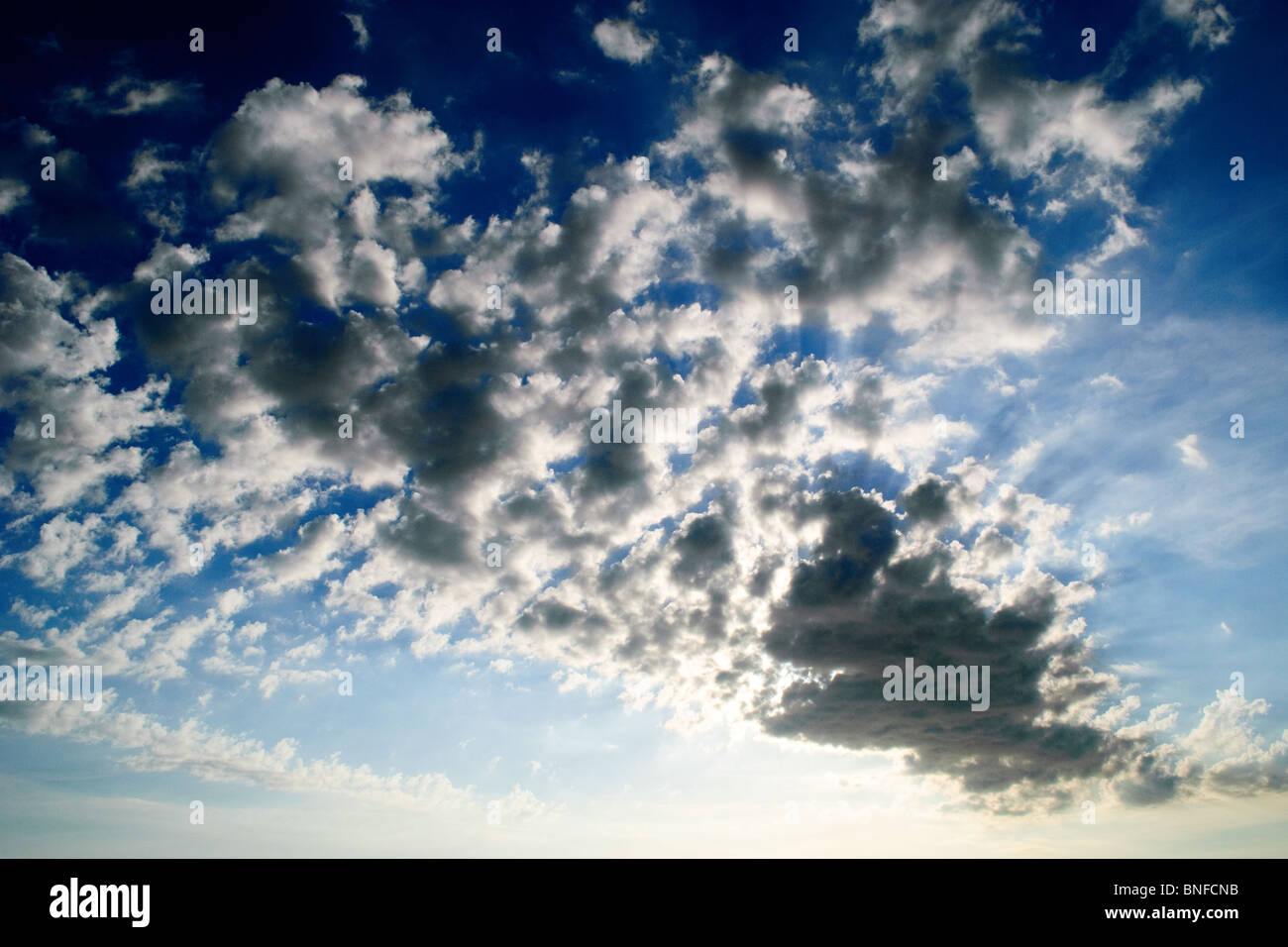nature background. Dark clouds over blue sky Stock Photo - Alamy