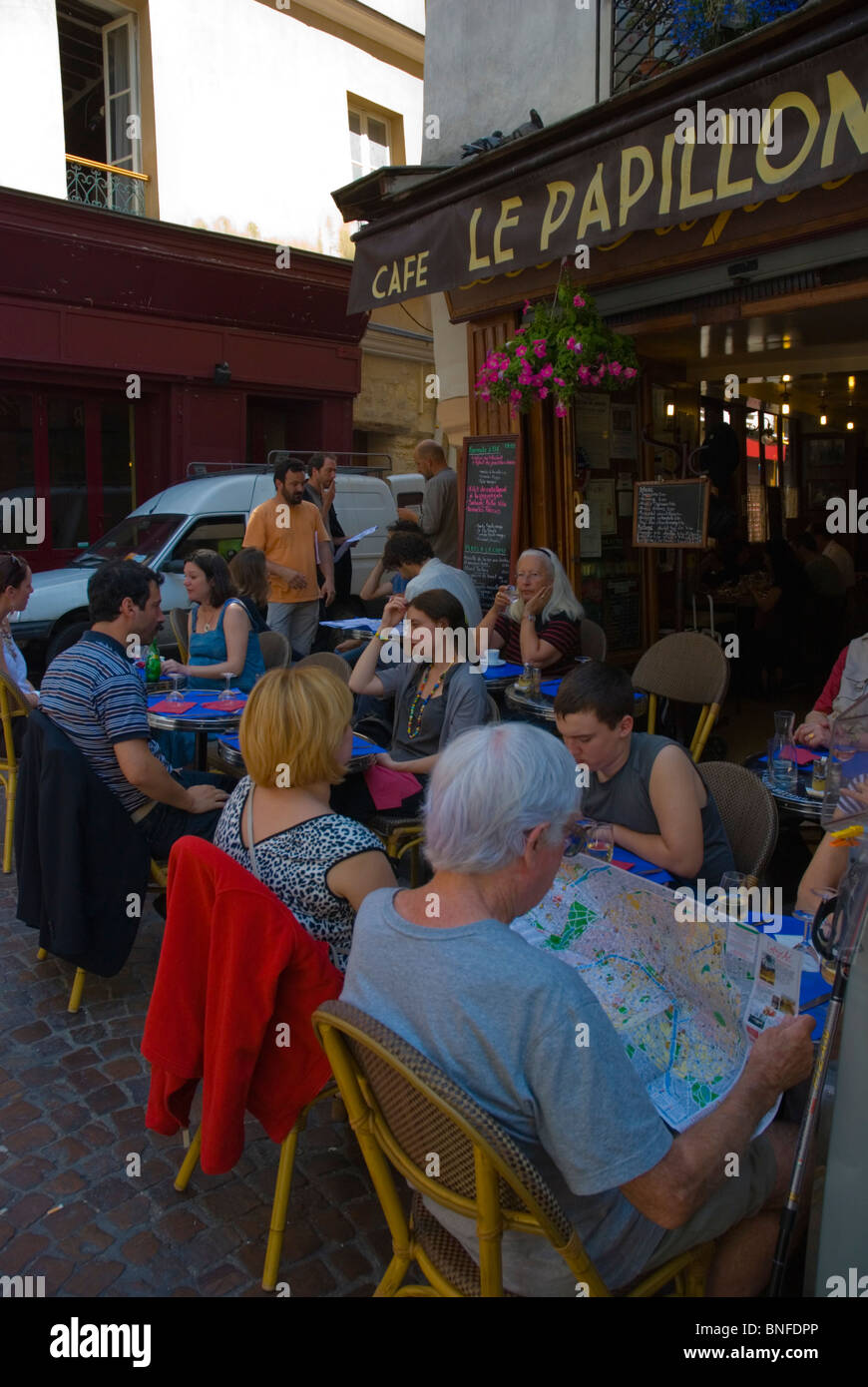 Cafe restaurant terrace Rue Mouffetard street Latin Quarter Paris France Europe Stock Photo