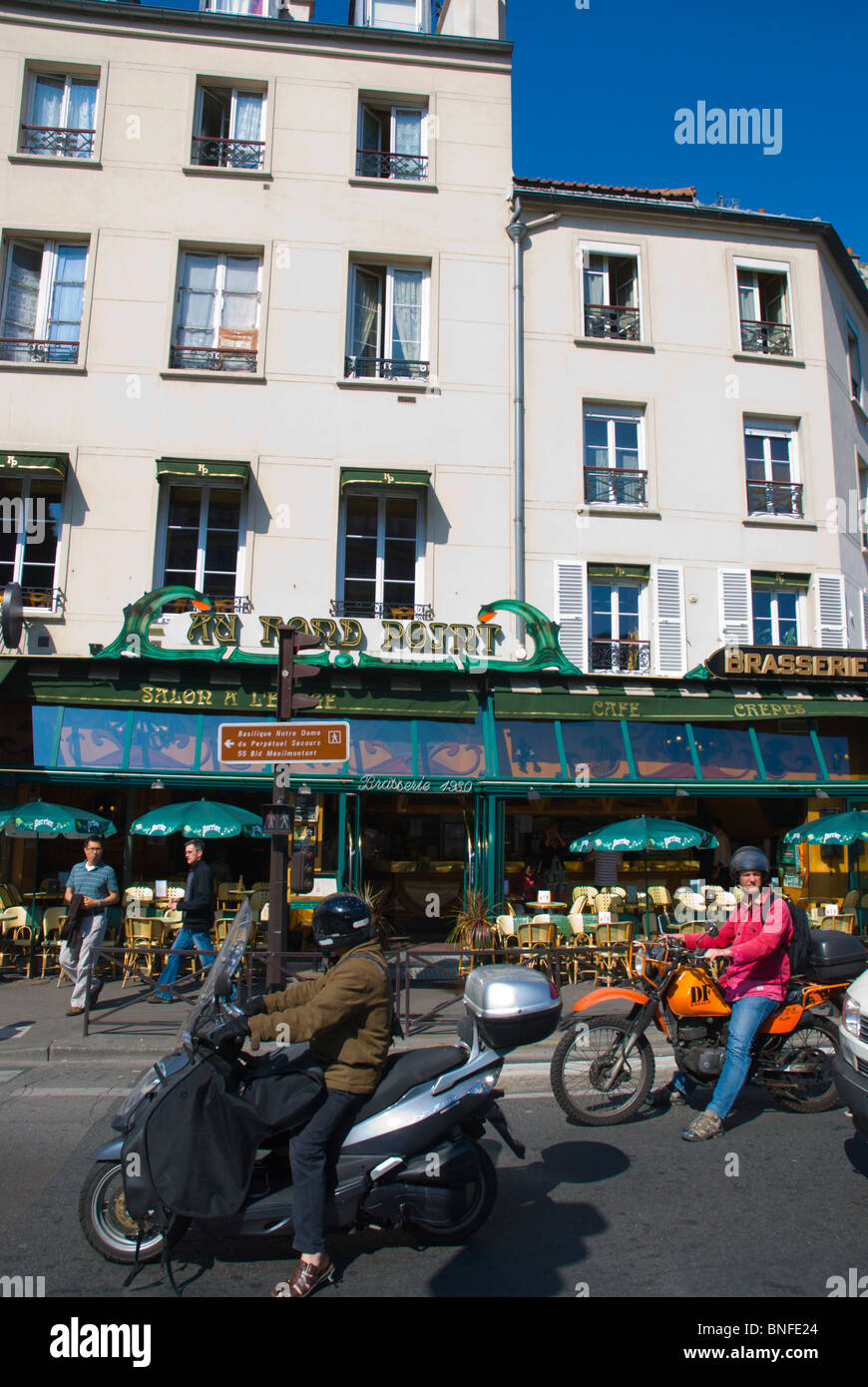 Motorbikes at traffic lights 11th arrodissement central Paris France Europe Stock Photo