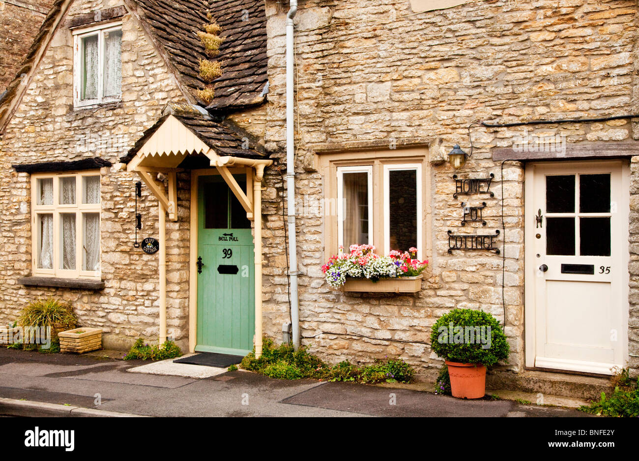 Typical quaint Cotswold stone cottages in Sherston village, Wiltshire