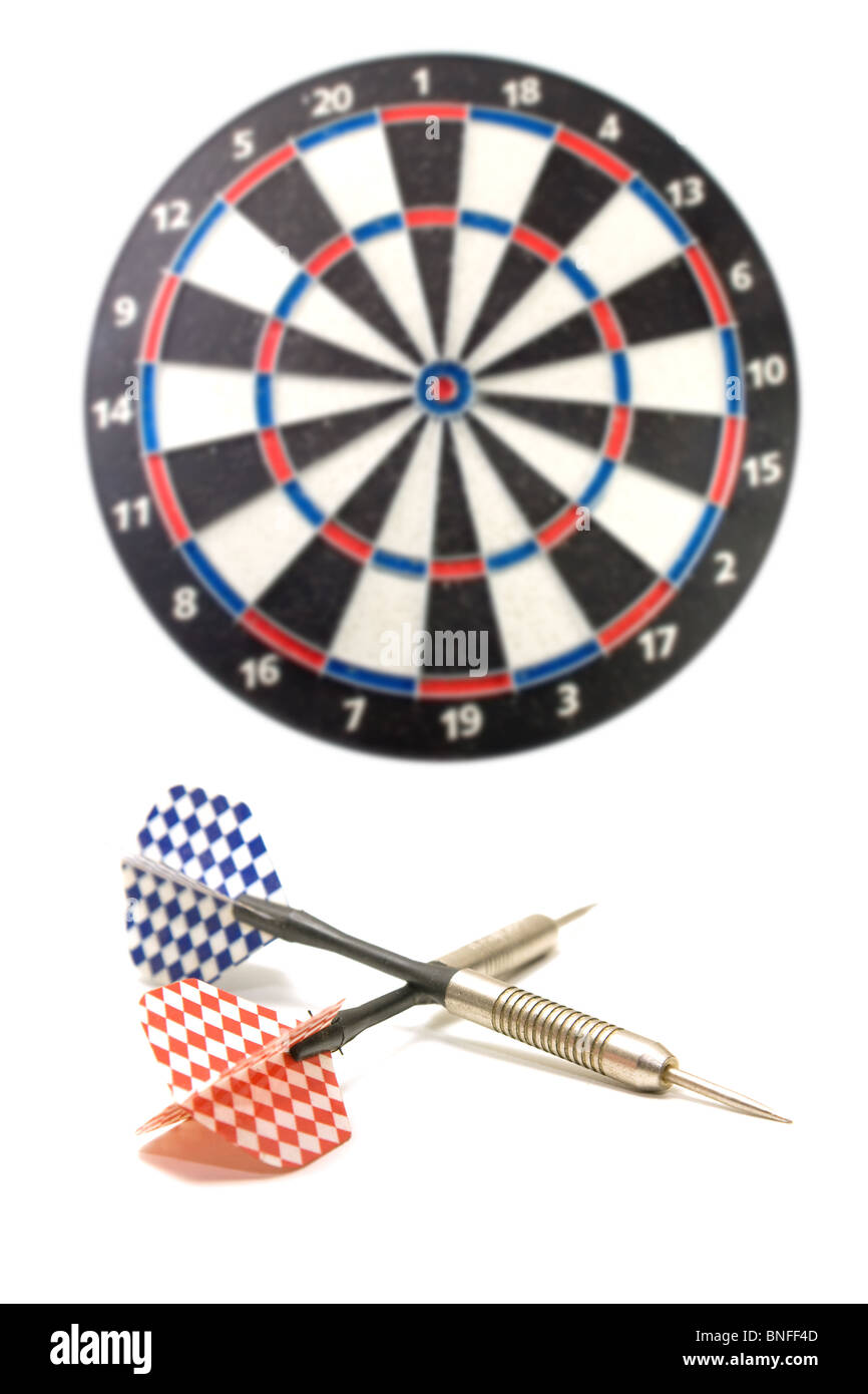 Two darts and blured dartboard behind Stock Photo