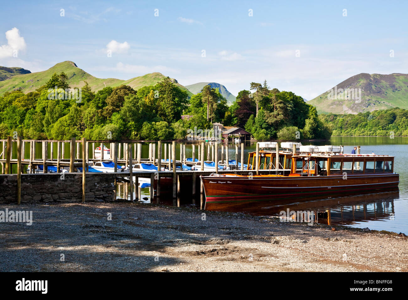 Cruiser by a landing stage on Derwent Water,at Keswick in the Lake District National Park, Cumbria, England, UK Stock Photo