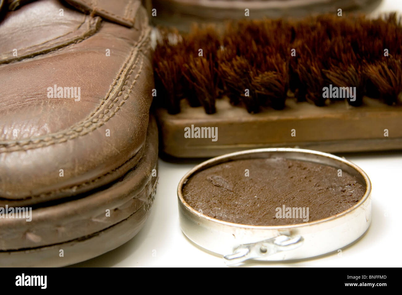 Brown shoe cream, shoe brush and shoe Stock Photo Alamy