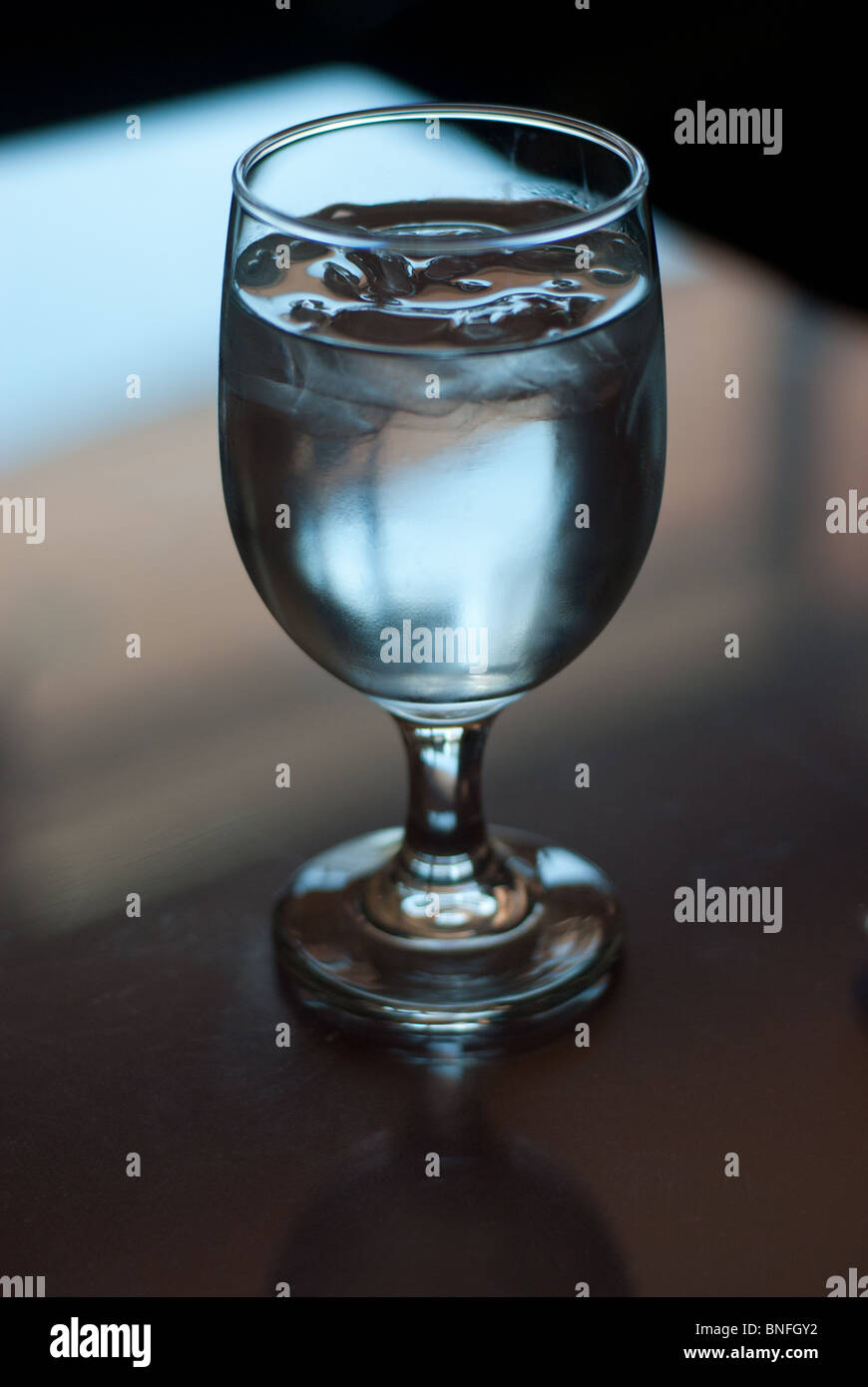 Glass of ice water at a restaurant Stock Photo - Alamy
