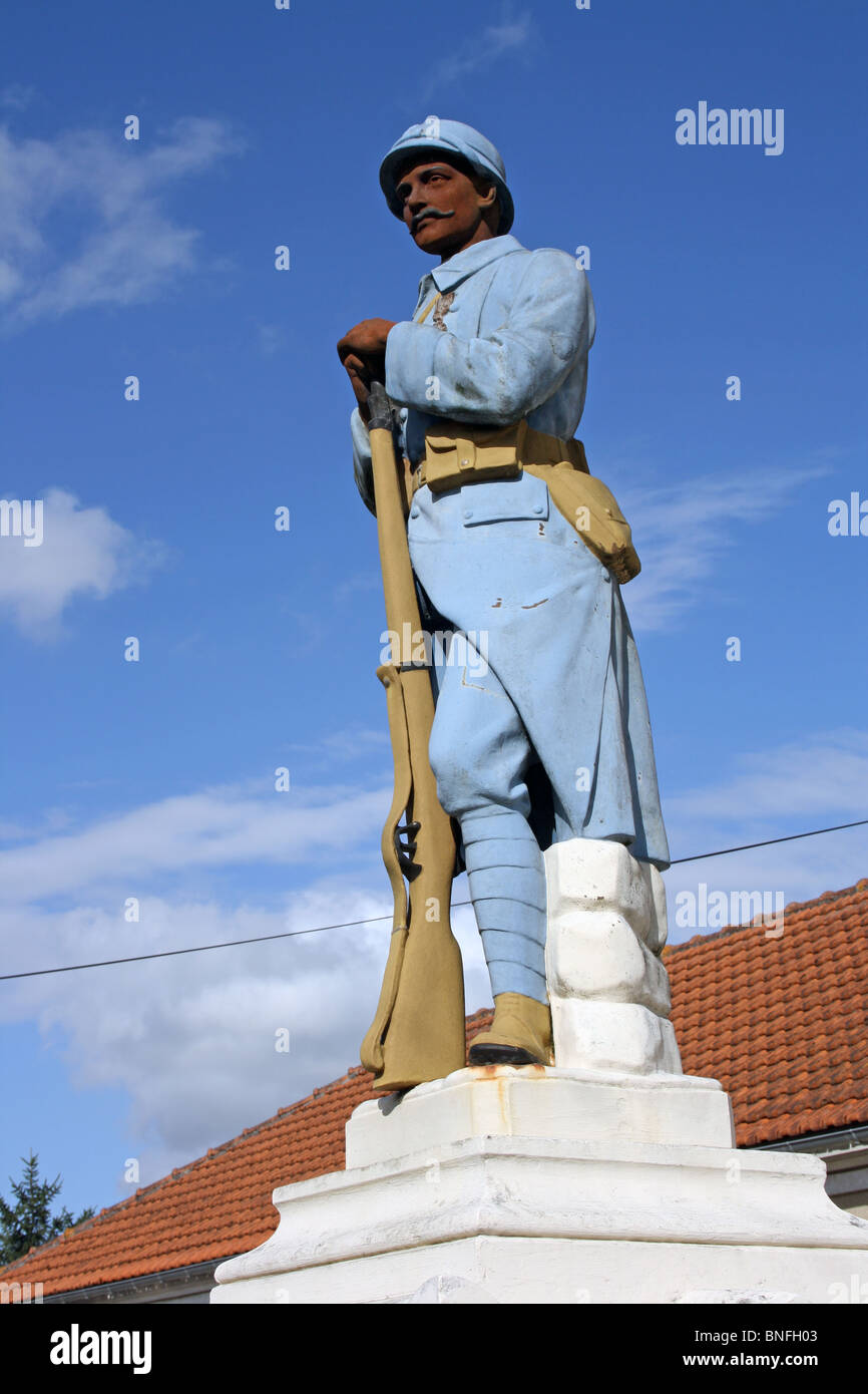 WWI War Memorial at St Genis de Hiersac, France, with sculpture of soldier Stock Photo