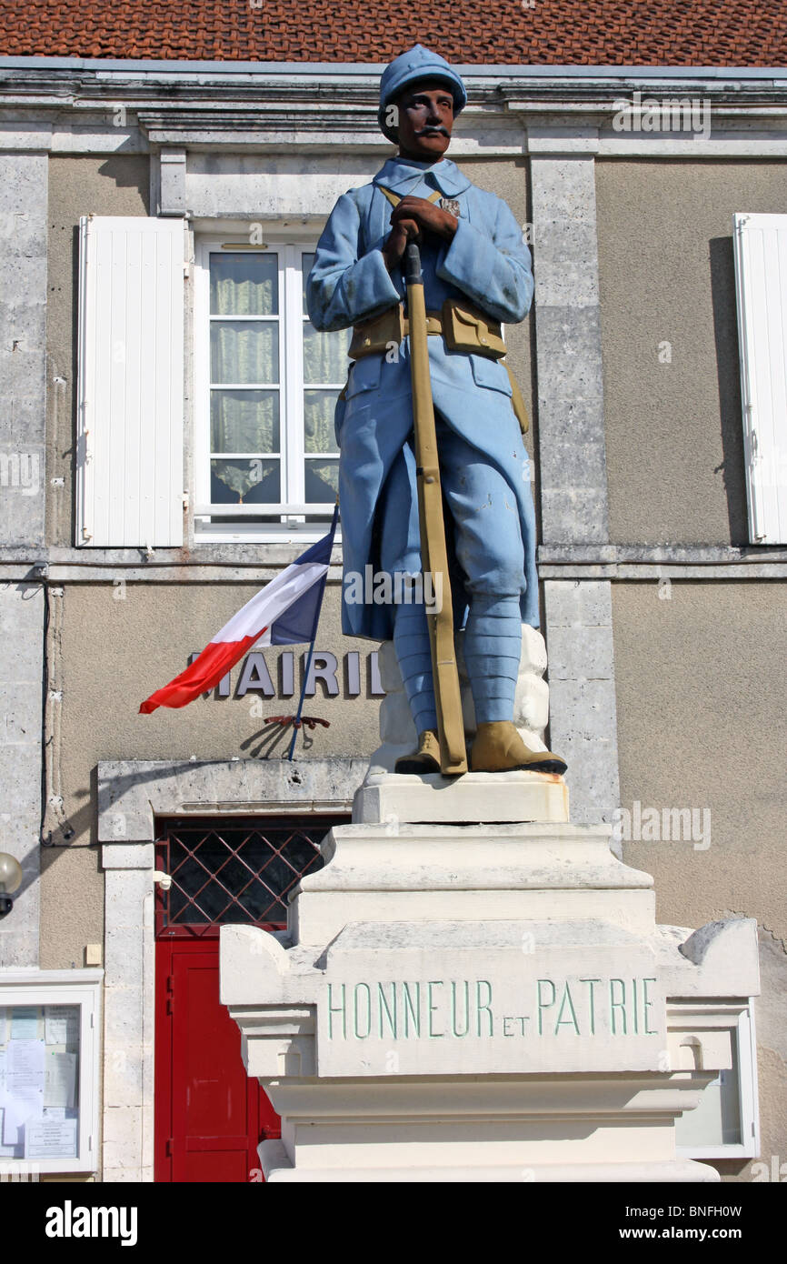 WWI War Memorial at St Genis de Hiersac, France, with sculpture of soldier Stock Photo