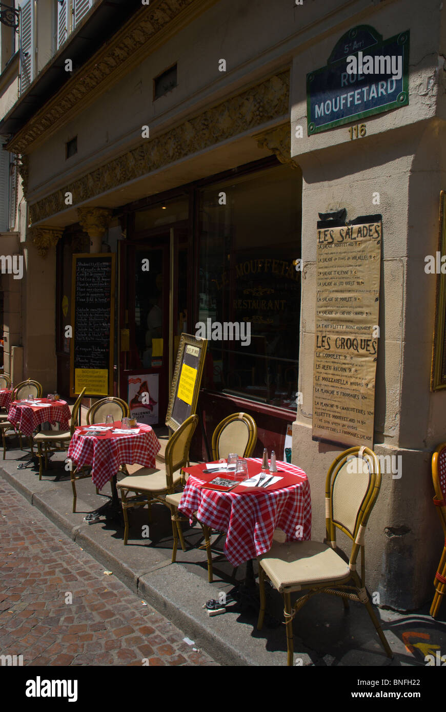 Empty street cafe Rue Mouffetard street Latin Quarter Paris France Europe Stock Photo