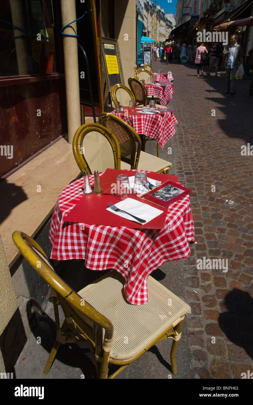 Empty street cafe Rue Mouffetard street Latin Quarter Paris France Europe Stock Photo