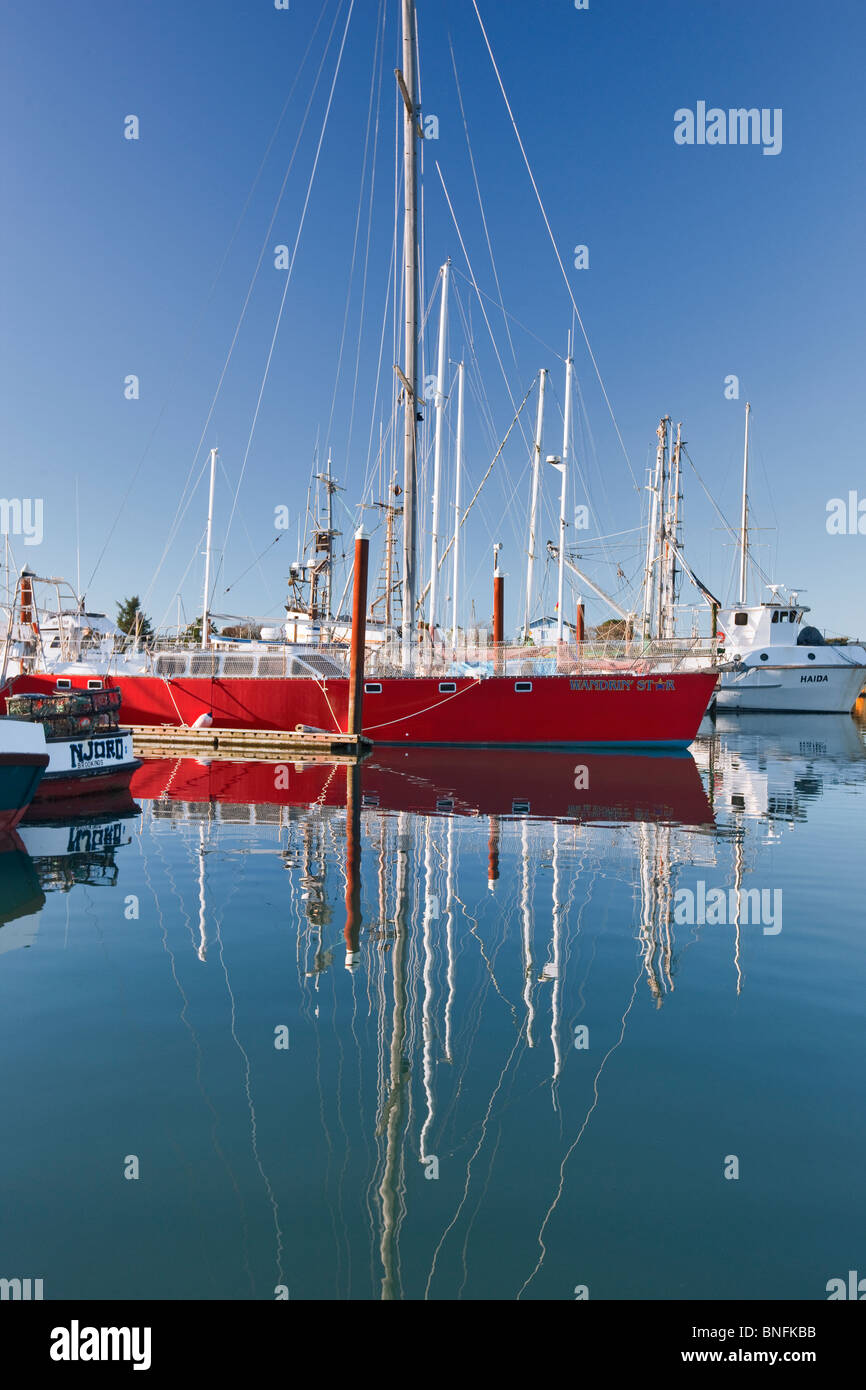 Boats in Brookings Harbor with reflection. Oregon Stock Photo