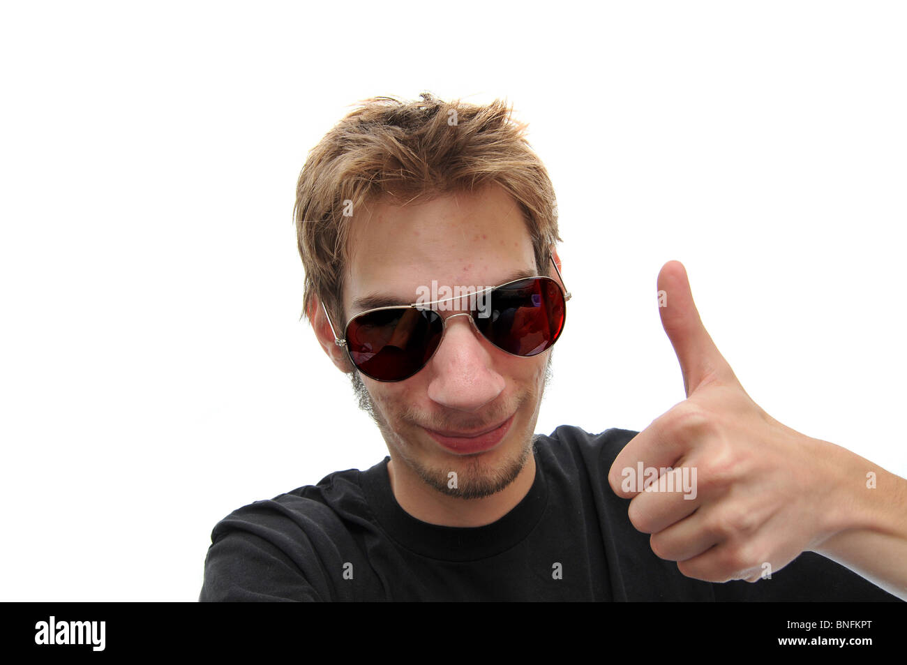 young-man-giving-a-reassuring-smile-wearing-aviator-sunglasses-isolated-BNFKPT.jpg