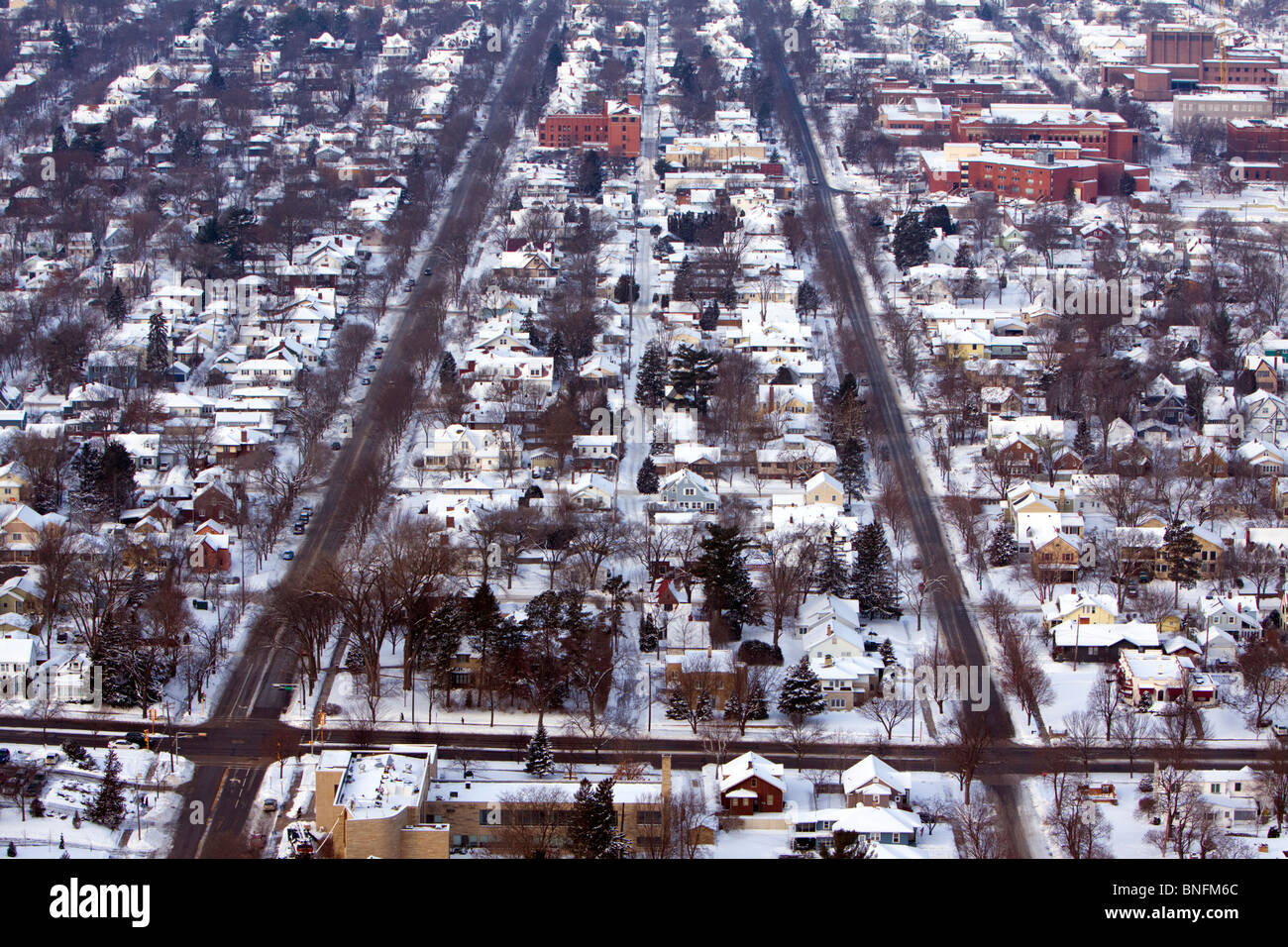 Seen from high above on a bluff, the town of La Crosse, WI is coated in winter snow. Stock Photo
