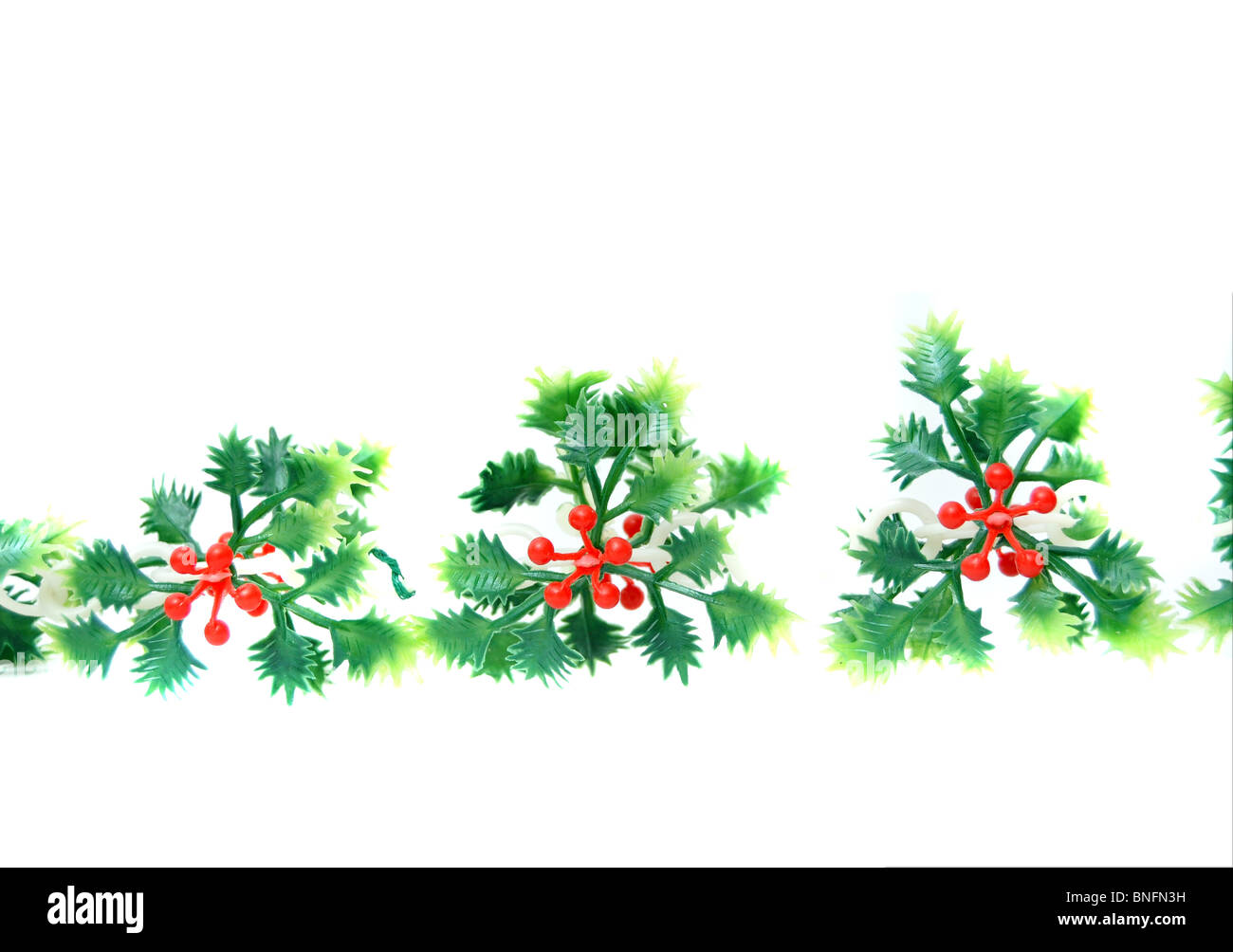 Holly garland hi-res stock photography and images - Alamy
