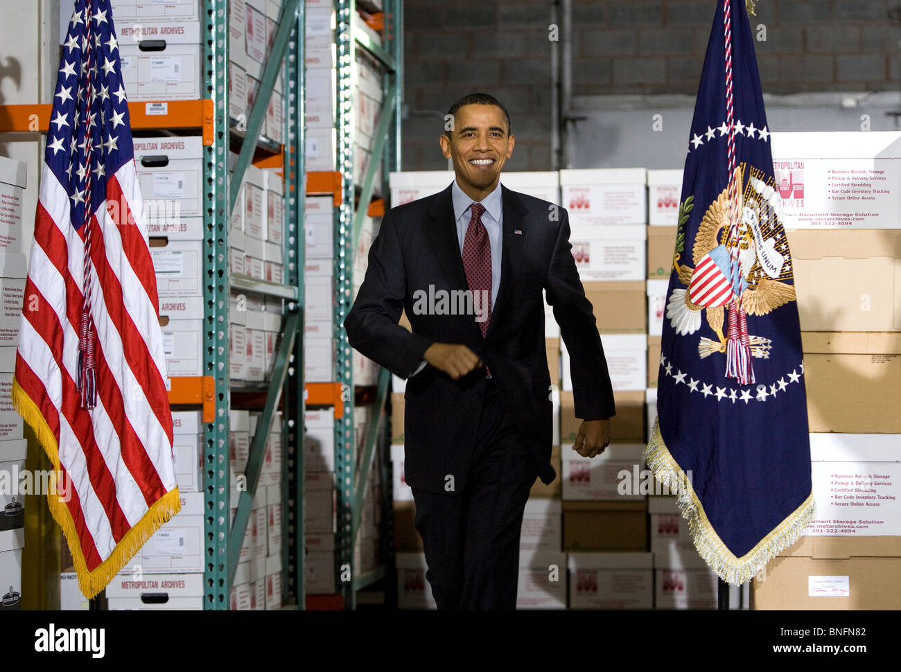 President Barack Obama Speaks at a storage warehouse to promote small business. Stock Photo
