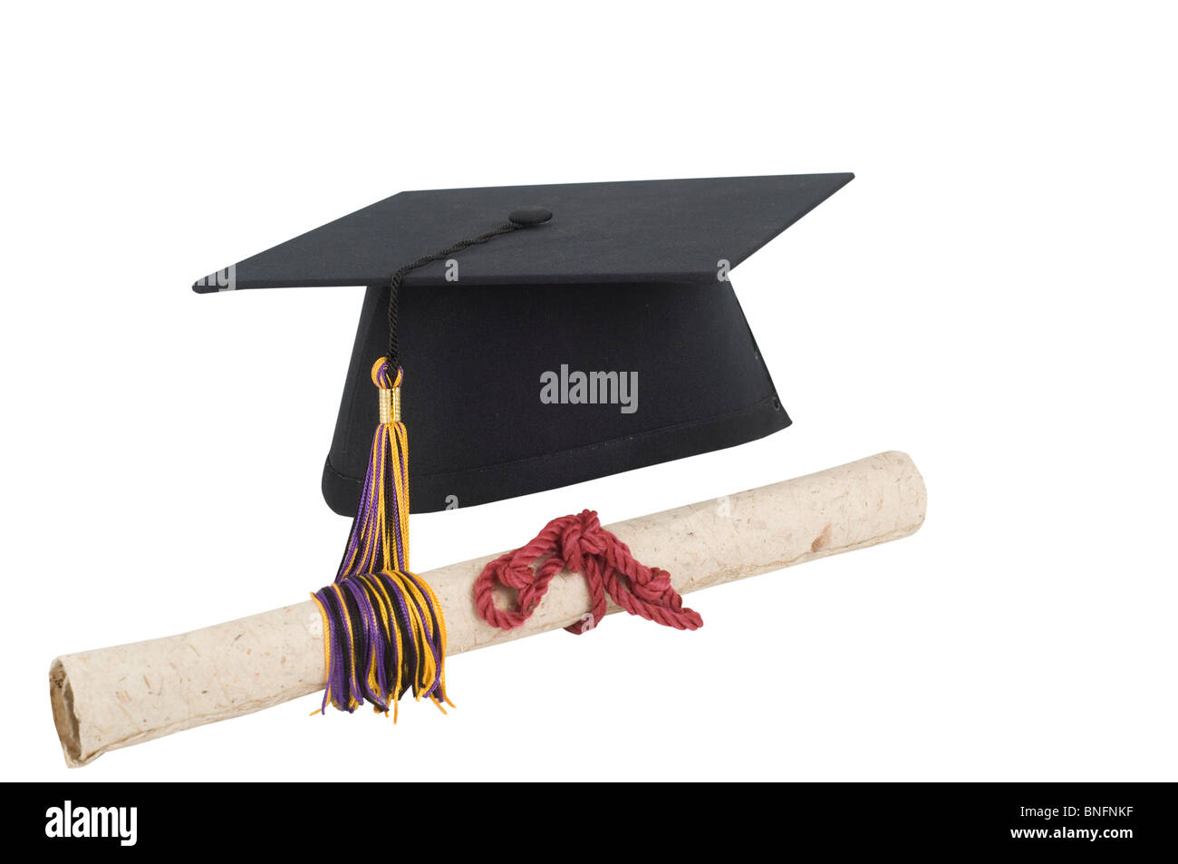 Graduation cap and diploma isolated on white Stock Photo - Alamy