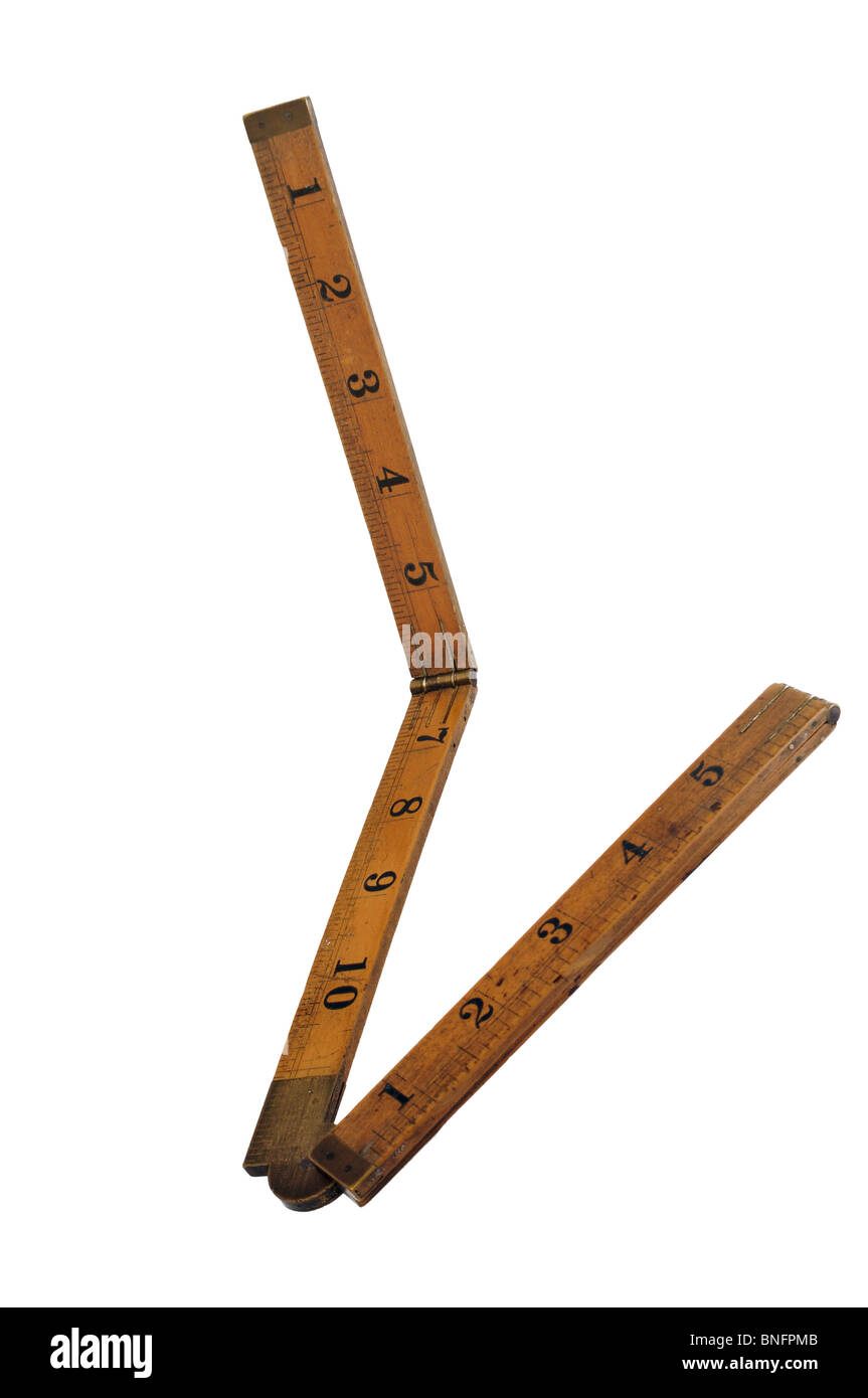 An old 24 inch fold up antique ruler isolated on a white