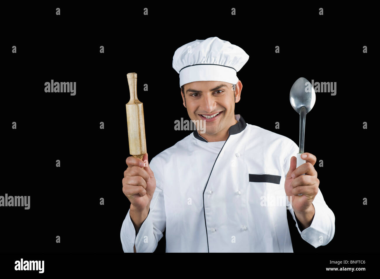 Chef holding rolling pin ladle hi-res stock photography and images - Alamy
