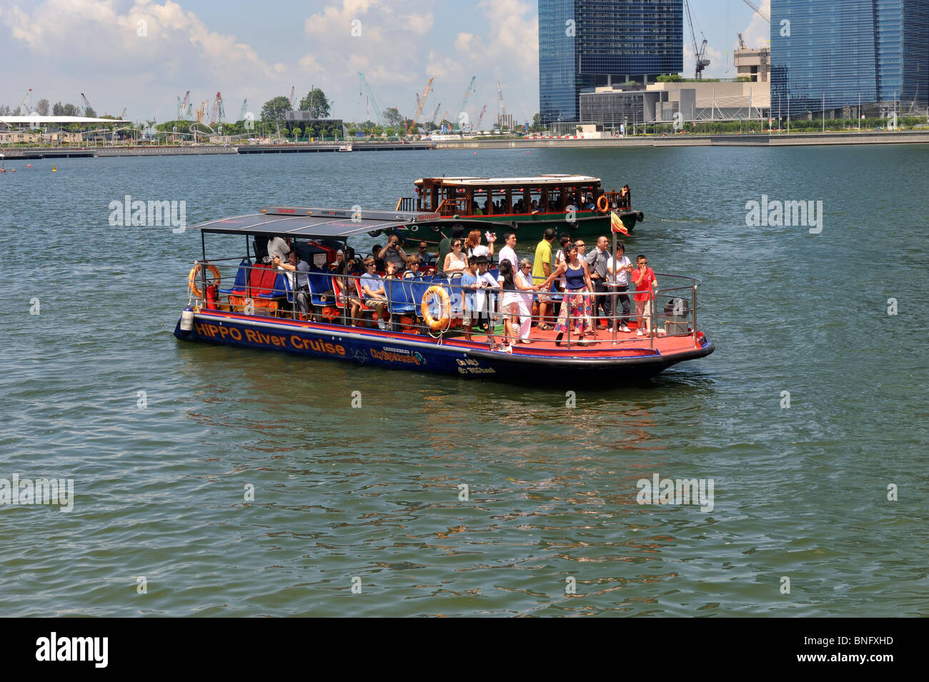 Tour boat in Marina Bay, Singapore Stock Photo