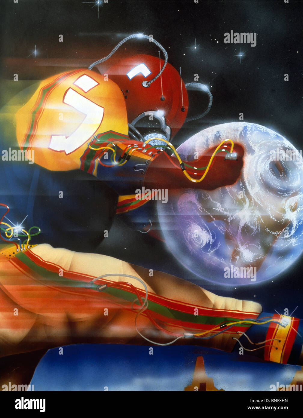 Cosmonaut in american football uniform Stock Photo