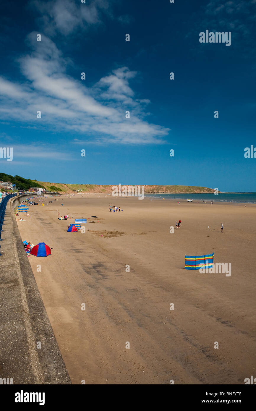 Sun Bathers Enjoying the British Summer on the Beach in the Resort of Filey. Stock Photo