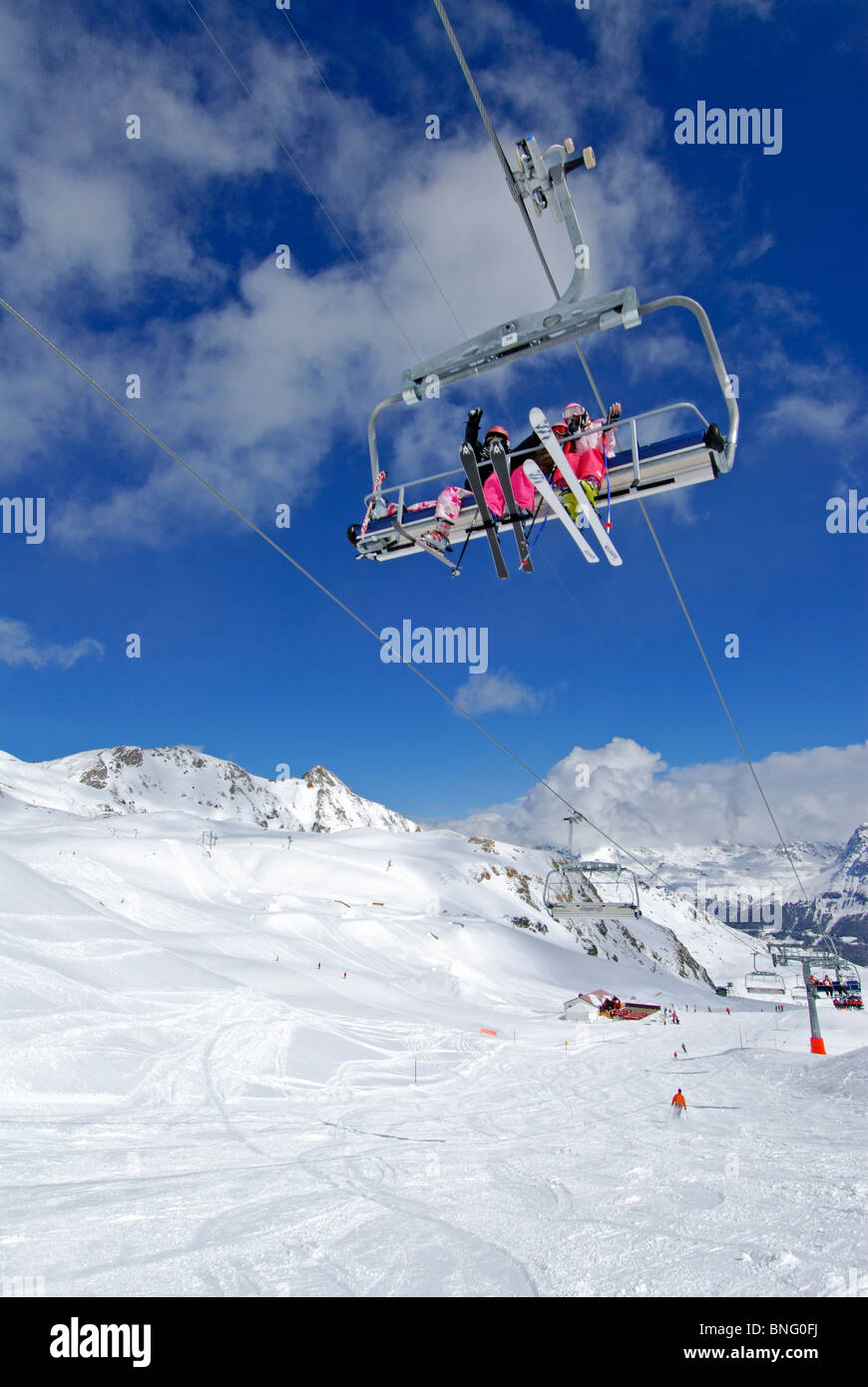 Skiers on chairlift in Grimentz, Swiss Alps, Switzerland, Europe Stock Photo