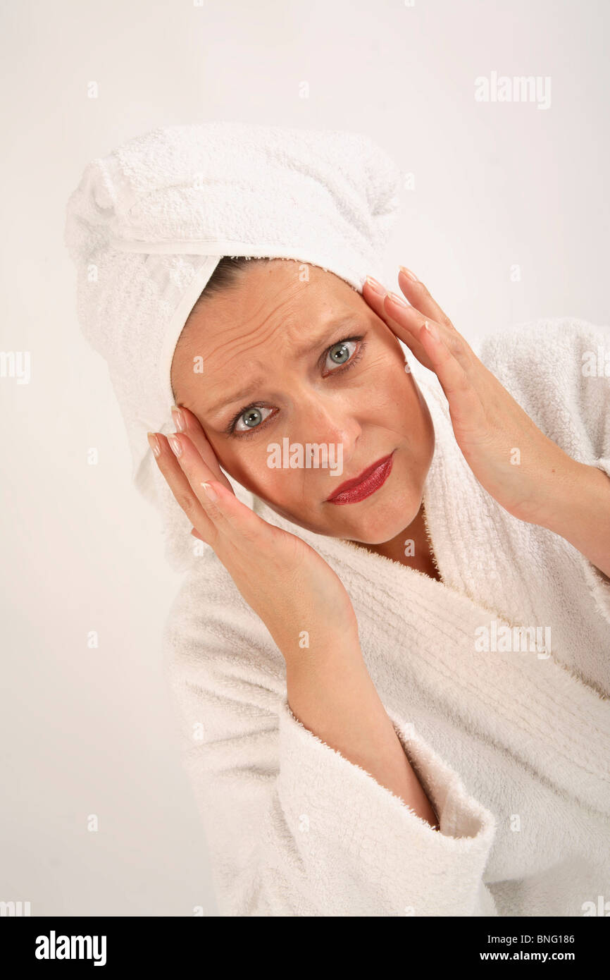 Woman discovering wrinkles Stock Photo
