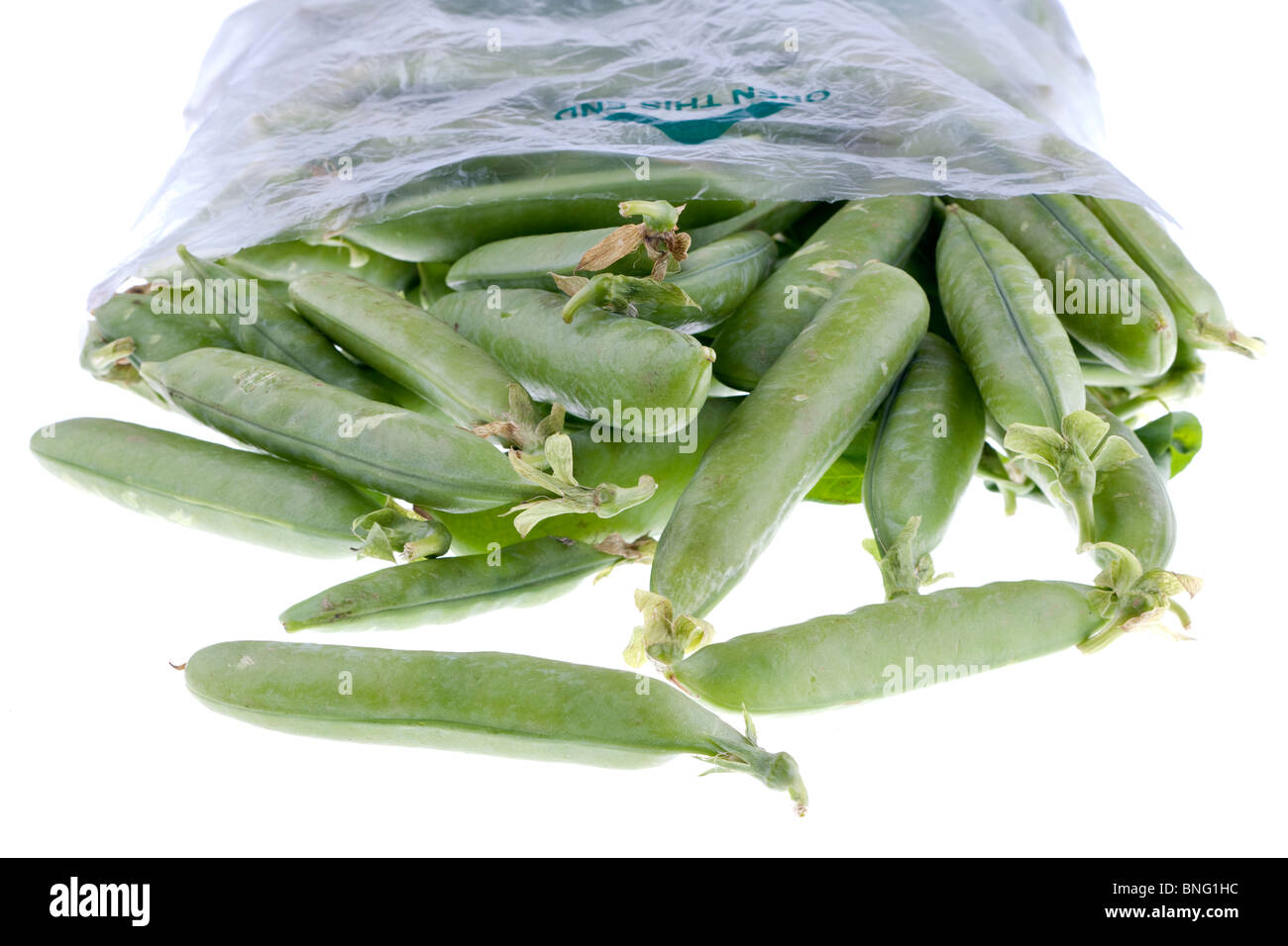 Bag of fresh peas in pods Stock Photo