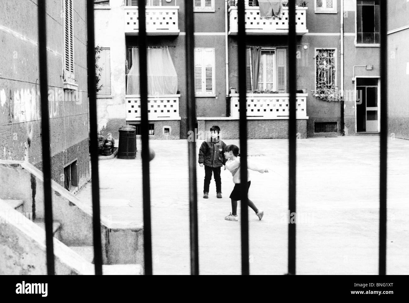 children playing in the yard,italy 70's Stock Photo