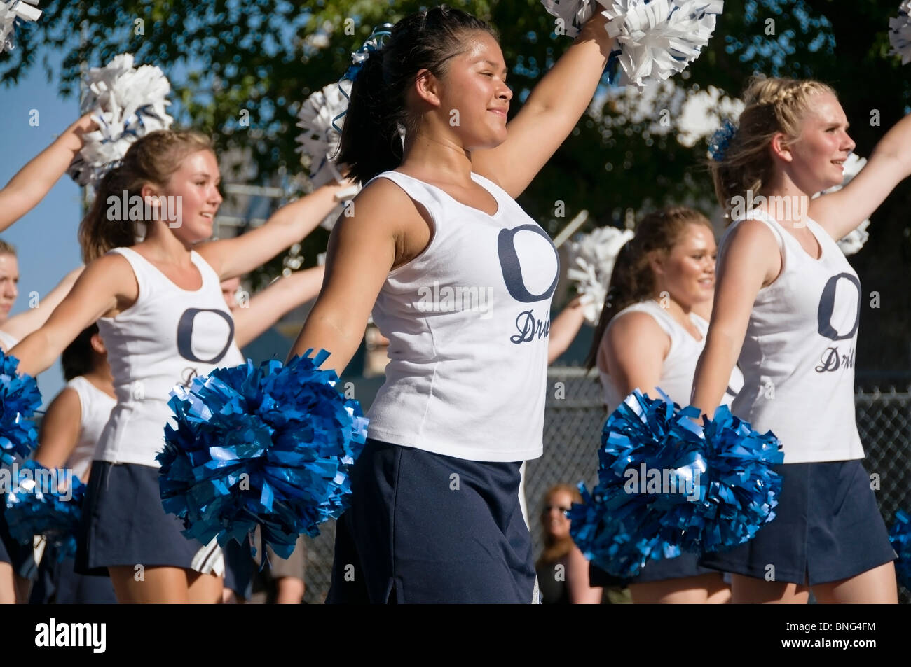 Teens from Olympia High School's Drill Team entertain the crowd during