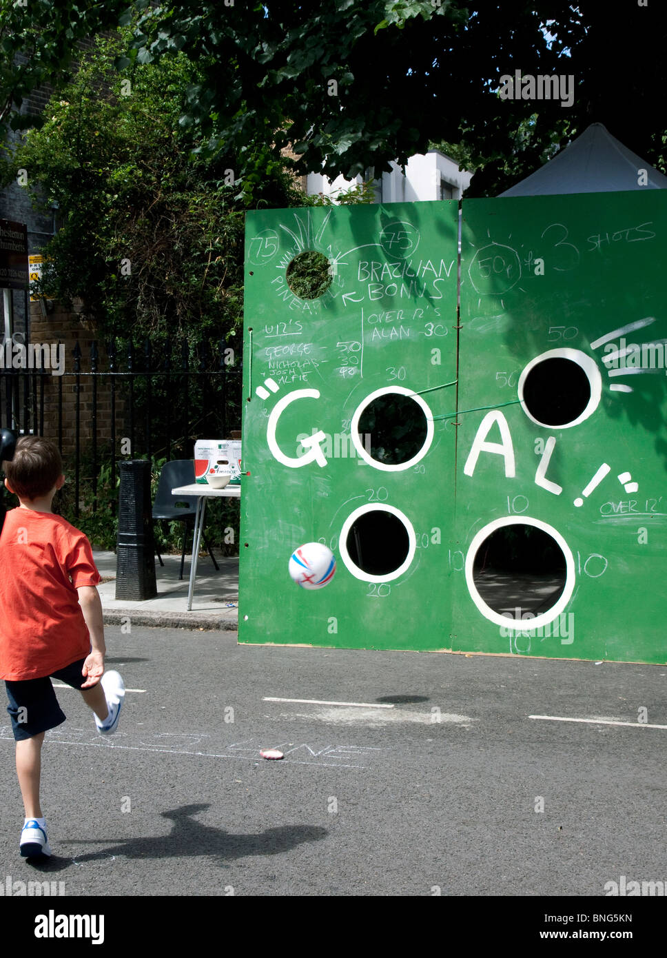 Goalkicking game at London street party Stock Photo Alamy