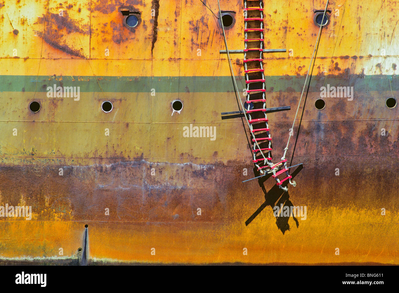 Rope ladder hanging on a rusty container ship, Victoria, Vancouver Island, British Columbia, Canada Stock Photo