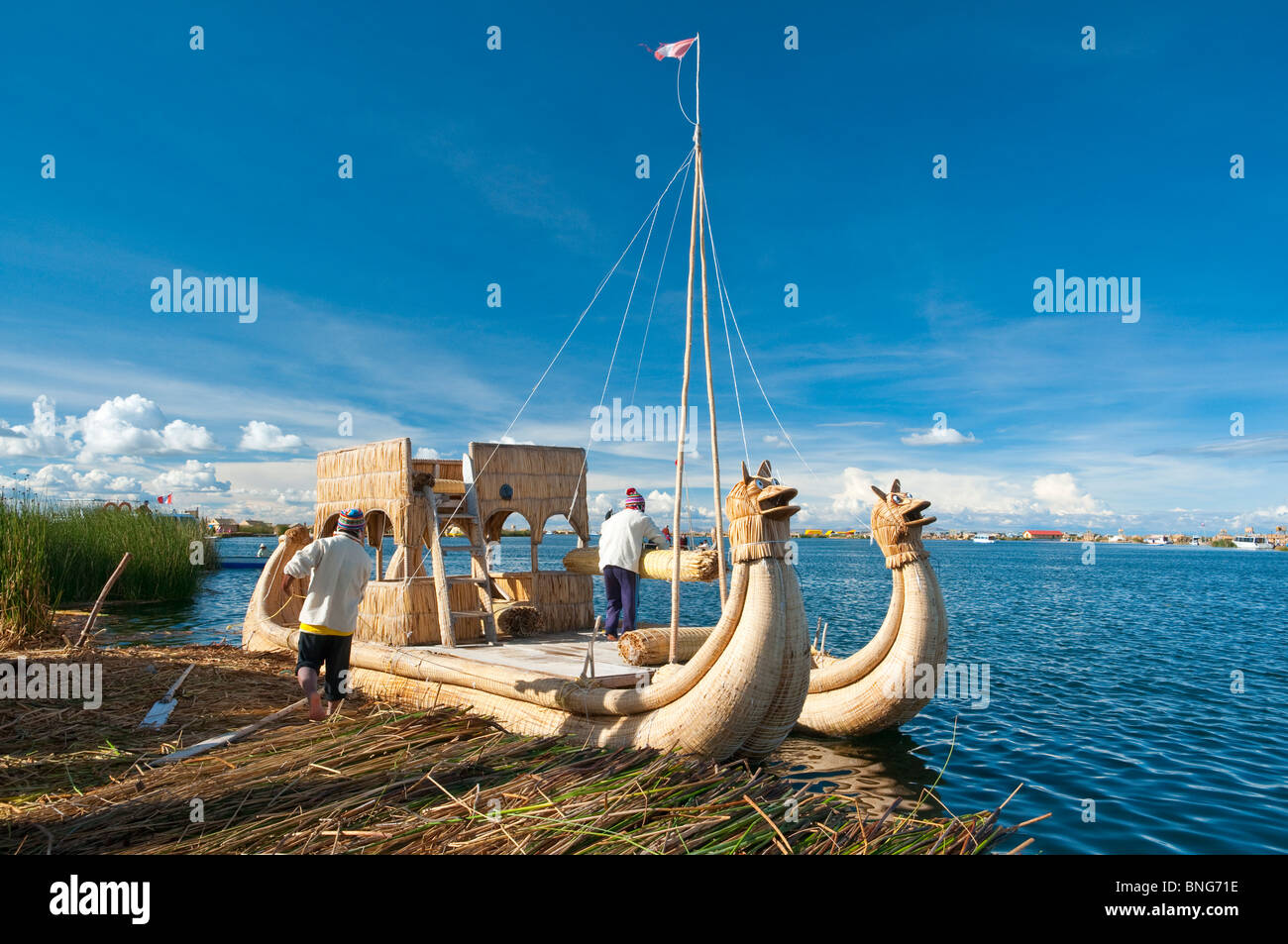 A large boat made of reeds at the floating Island of Uros in Lake Titicaca, Peru, South America. Stock Photo