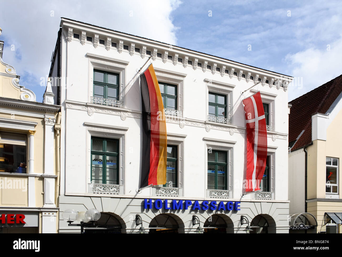 Holmpassage with German and Danish flags, Flensburg, Germany Stock Photo