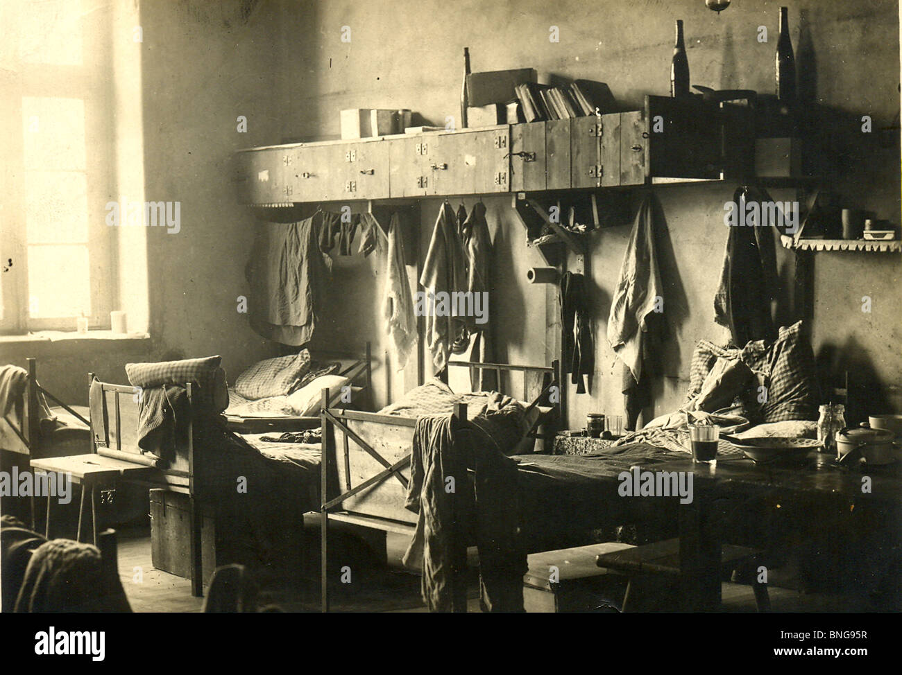 Bed and living room for officers at WW1 prisoner of war camp Holzminden, Germany Stock Photo
