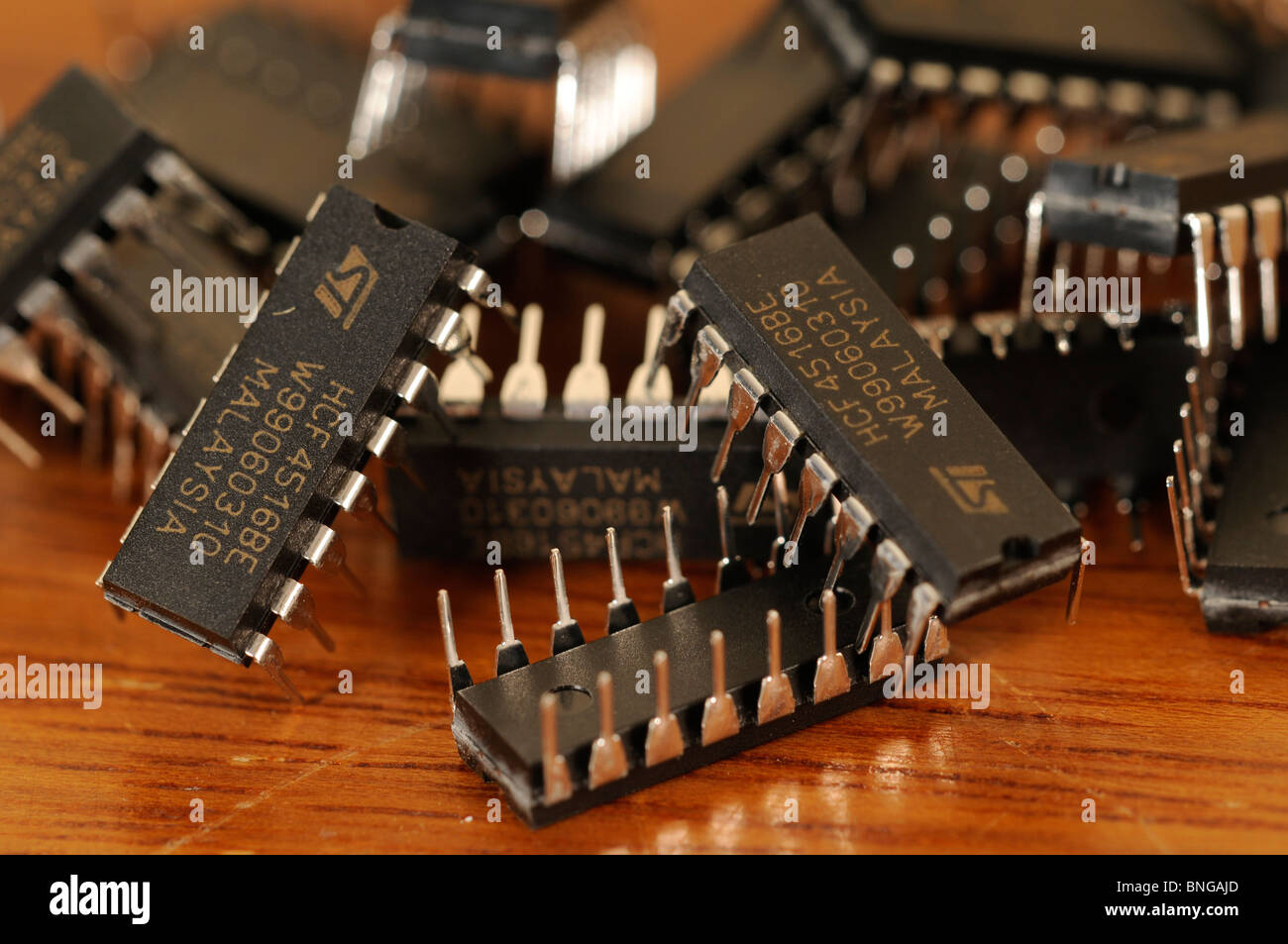 pile of 16 pin Integrated circuit chips Stock Photo