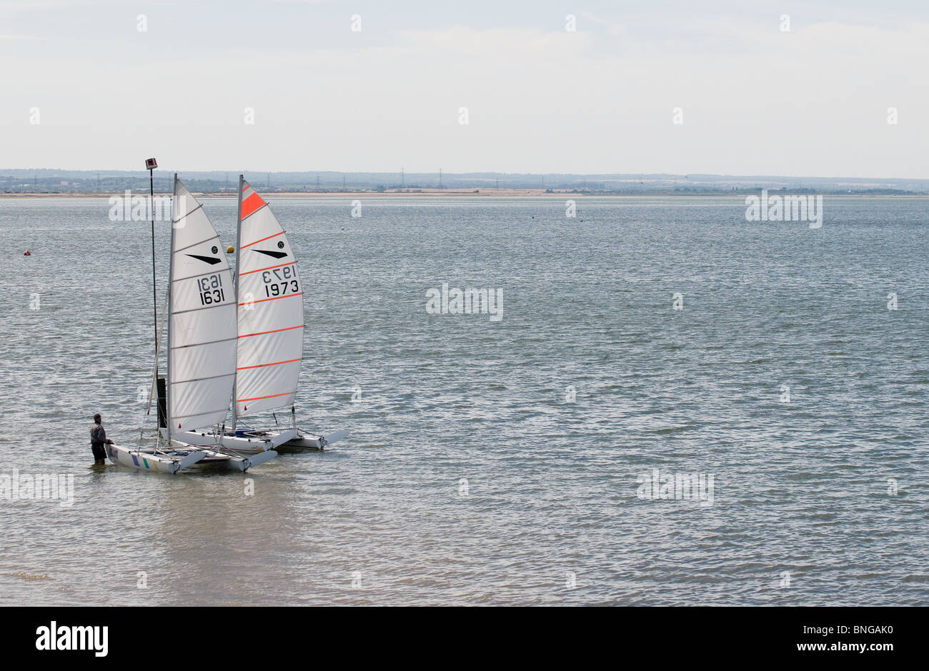 Two sailboats at Whitstable in Kent. Stock Photo