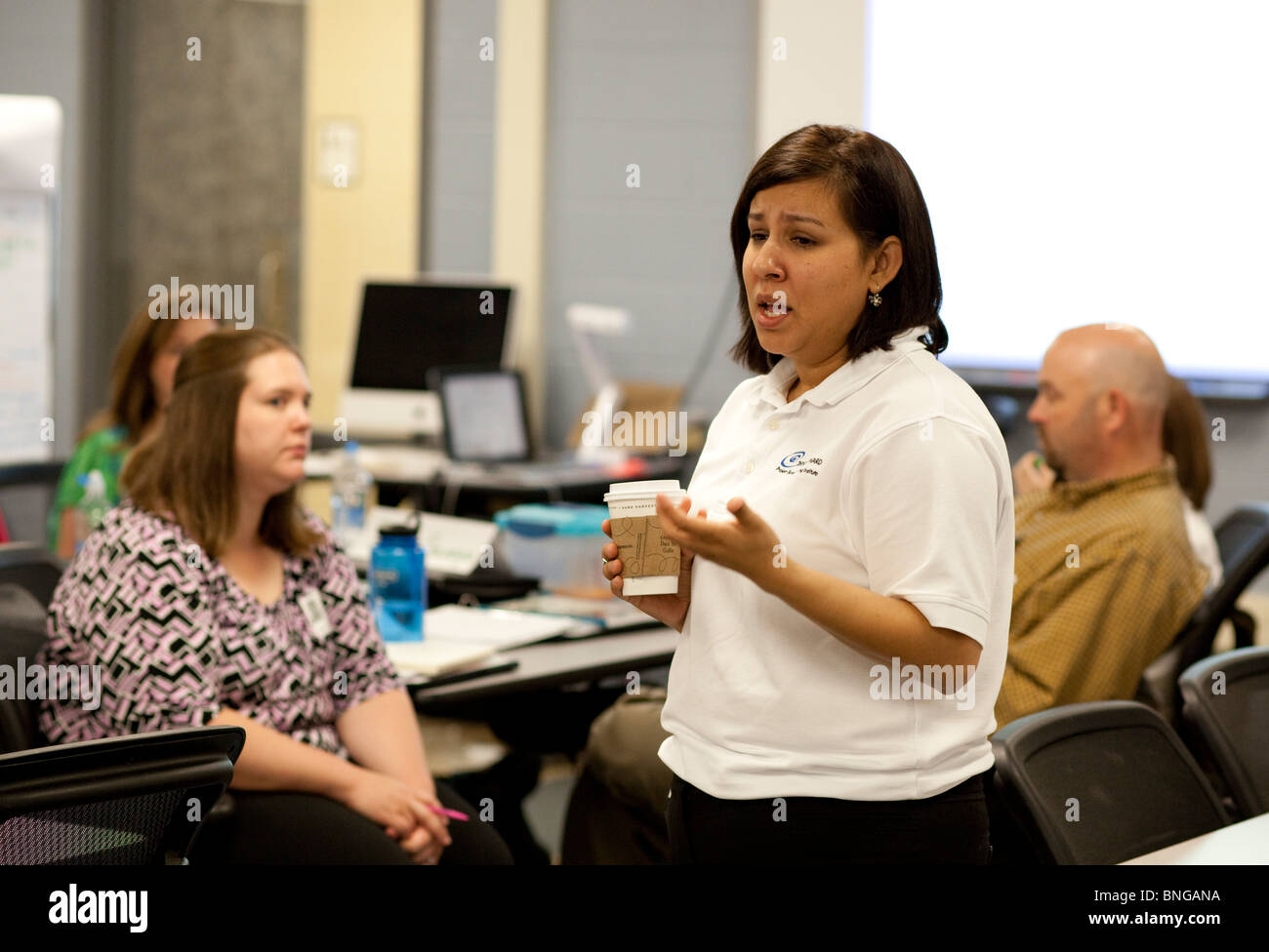 Teacher talks during faculty development session at Manor New Tech High School in Manor, Texas Stock Photo