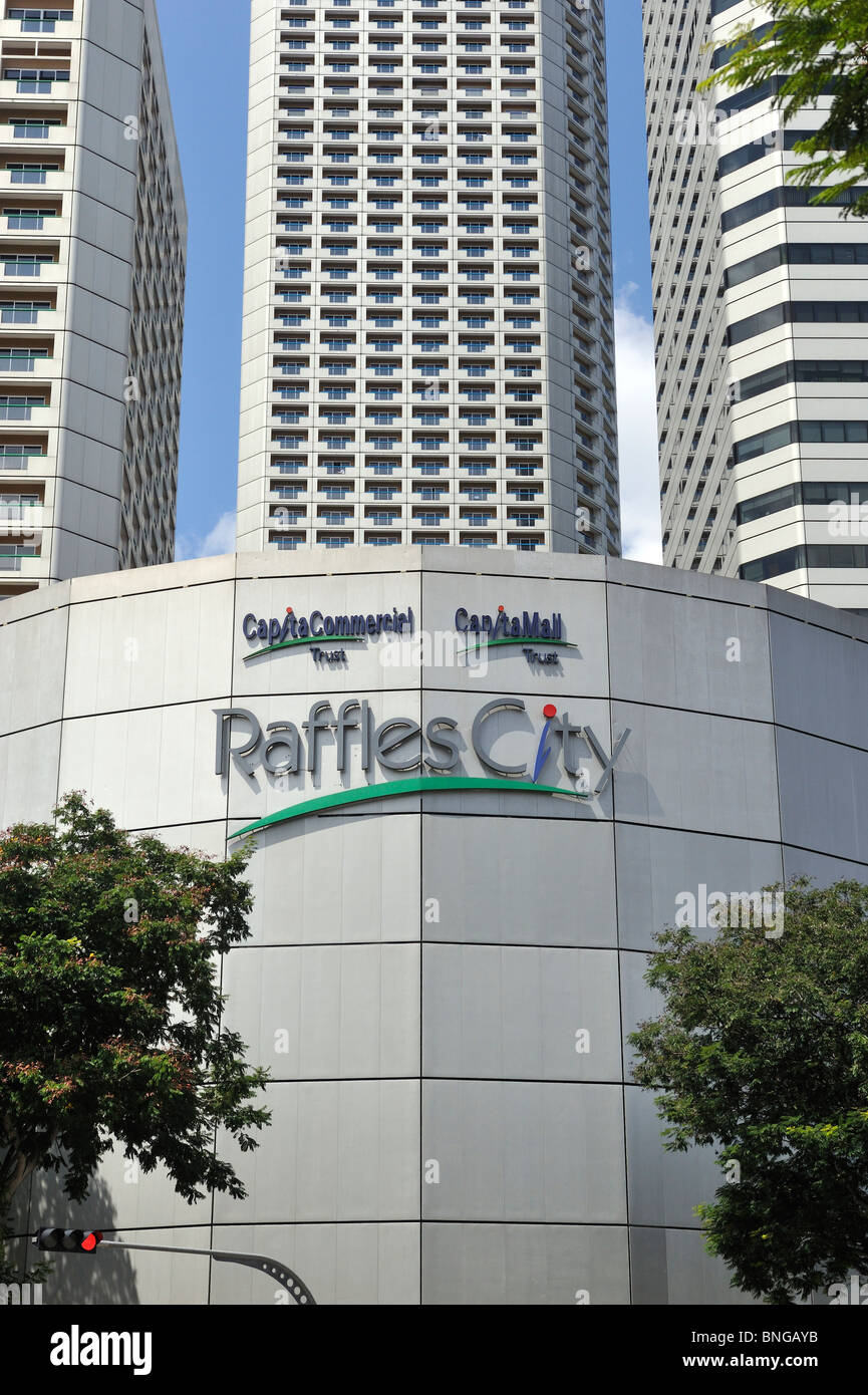 Raffles City shopping mall, Singapore, with the Swissotel Stamford above Stock Photo