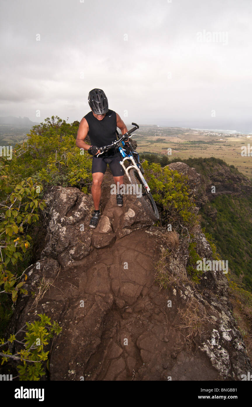 Mountain biking on Mt. Nonou (Sleeping Giant), Kauai, Hawaii Stock