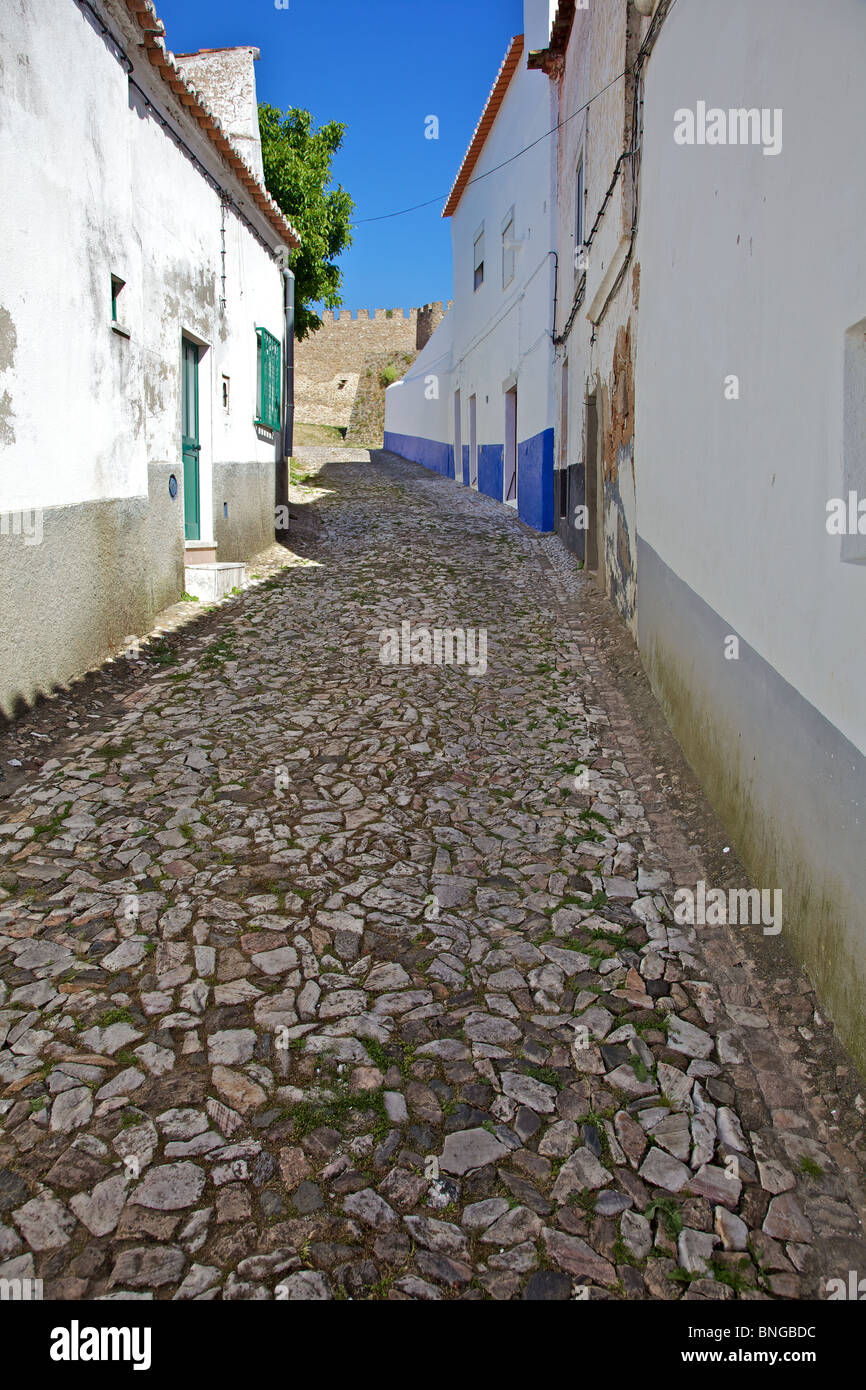 Cobblestone Street of the Medieval Village of Obidos Stock Photo