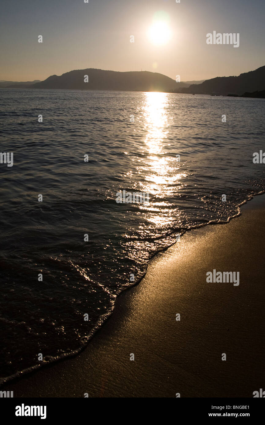 Sunset at Pefkos Beach, Rhodes Island, Greece Stock Photo