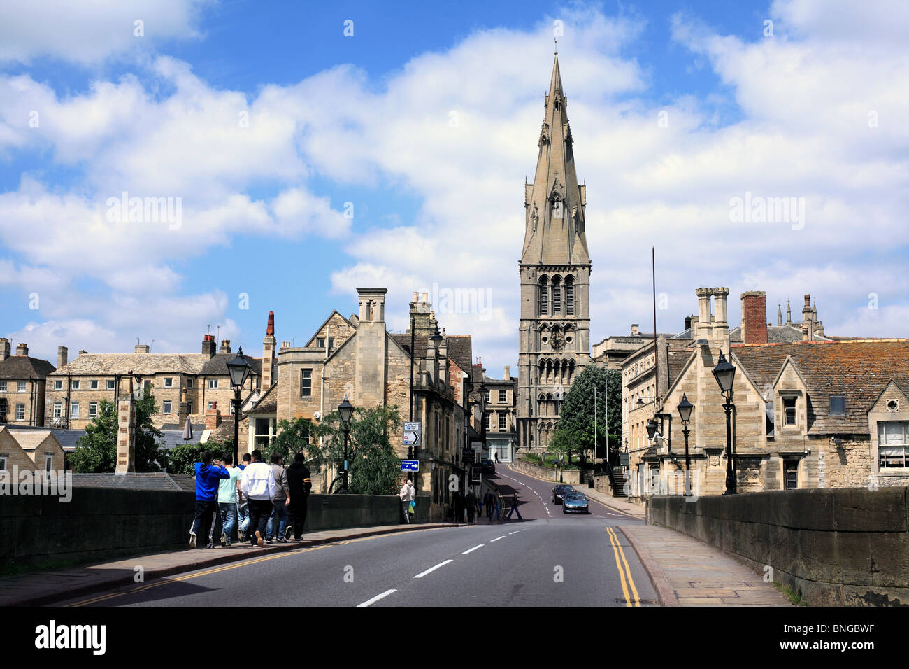 View of the approach to Stamford town centre, looking across the R. Welland bridge along St. Mary's Hill, with St.Mary's Church ahead. Stock Photo