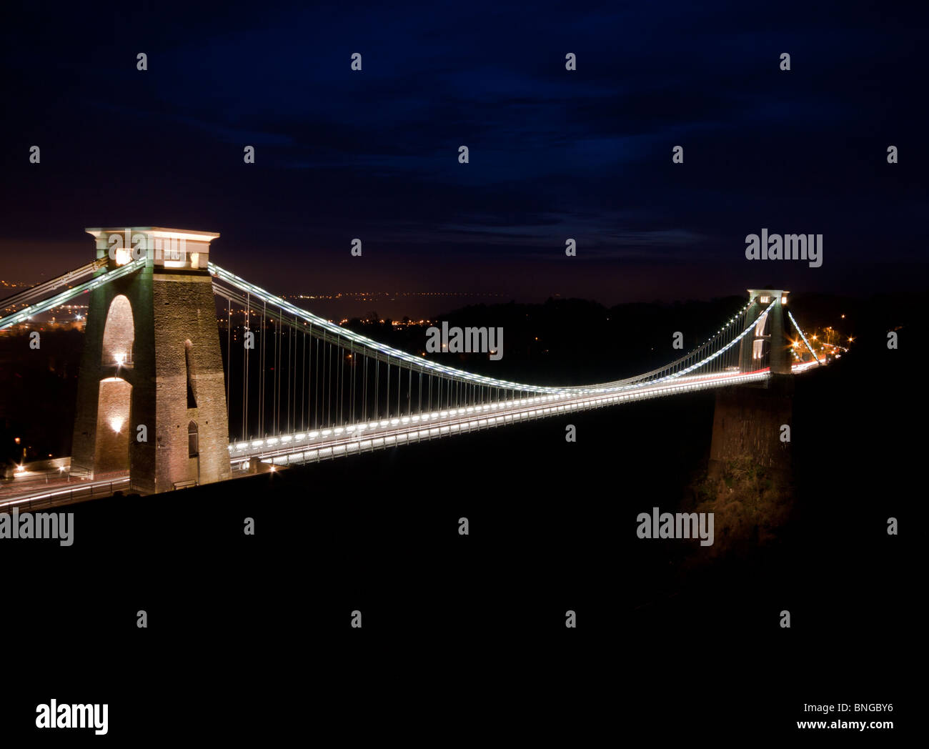 A night time shot of an illuminated Clifton Suspension Bridge, Bristol. This iconic bridge was designed an d constructed by isambard kingdom brunel Stock Photo