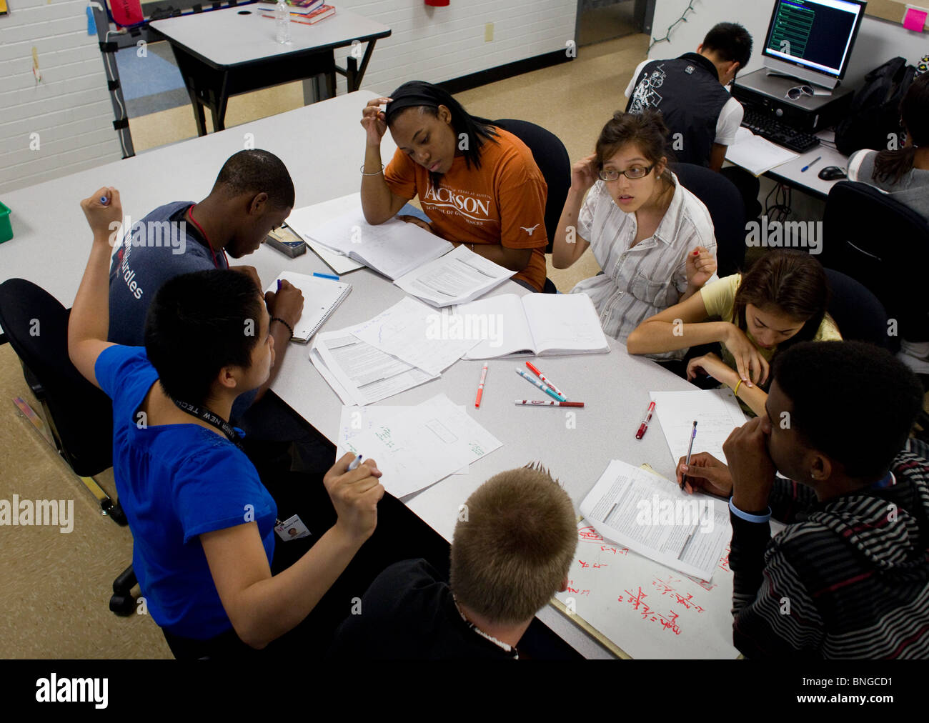 Female physics teacher leads discussion during class at Manor New Tech High School, an innovative project-based learning school Stock Photo