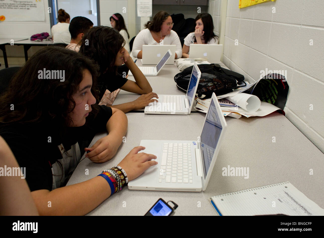 Students work on laptop computers in classroom at Manor New Tech High School, an innovative public school in Manor, TX. Stock Photo