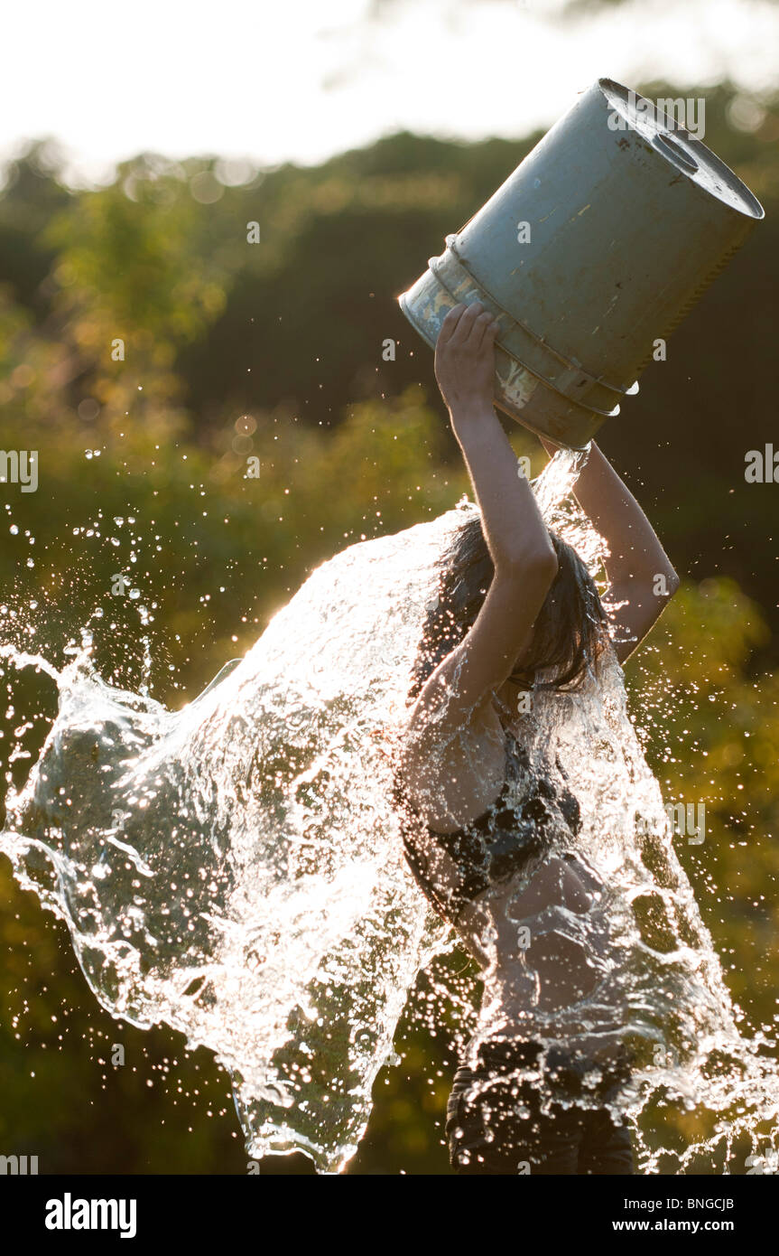 Pouring Water Over Head Stock Photos & Pouring Water Over Head Stock