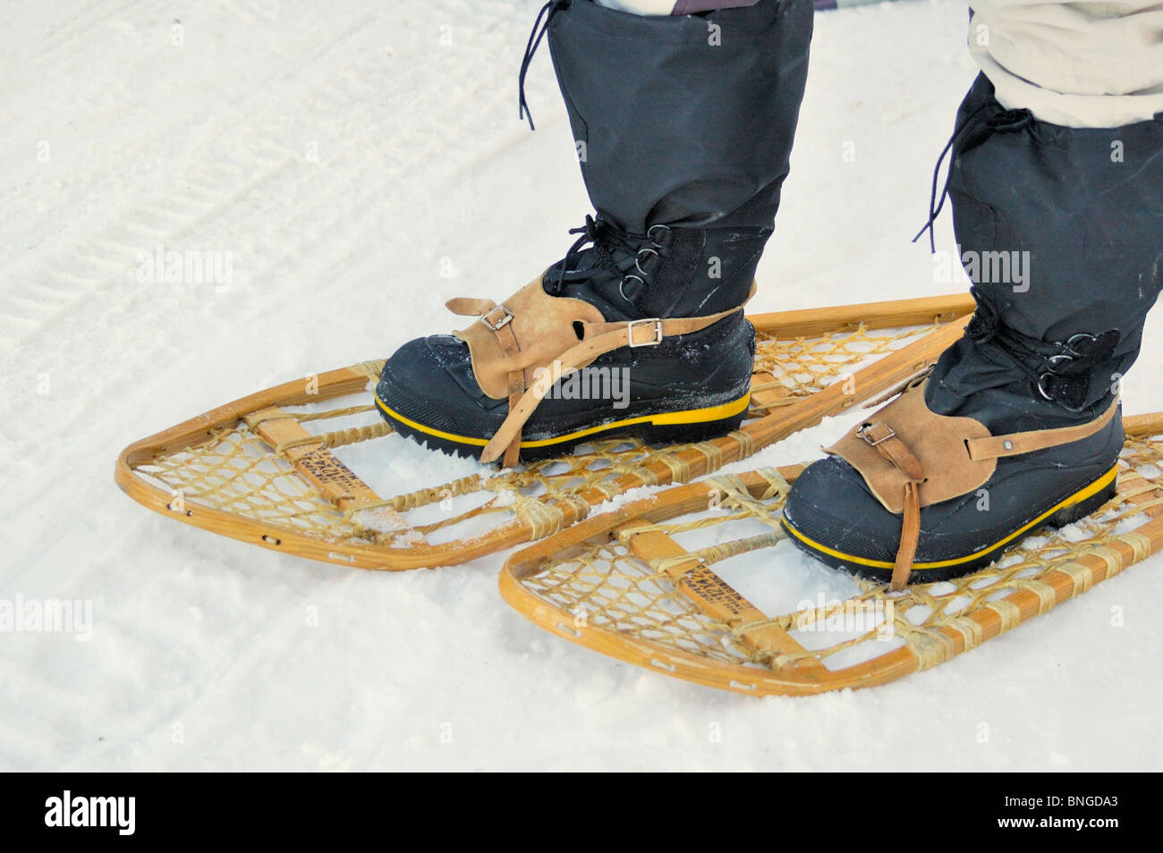 Closeup of old fashioned snowshoes in the Canadian north. Stock Photo