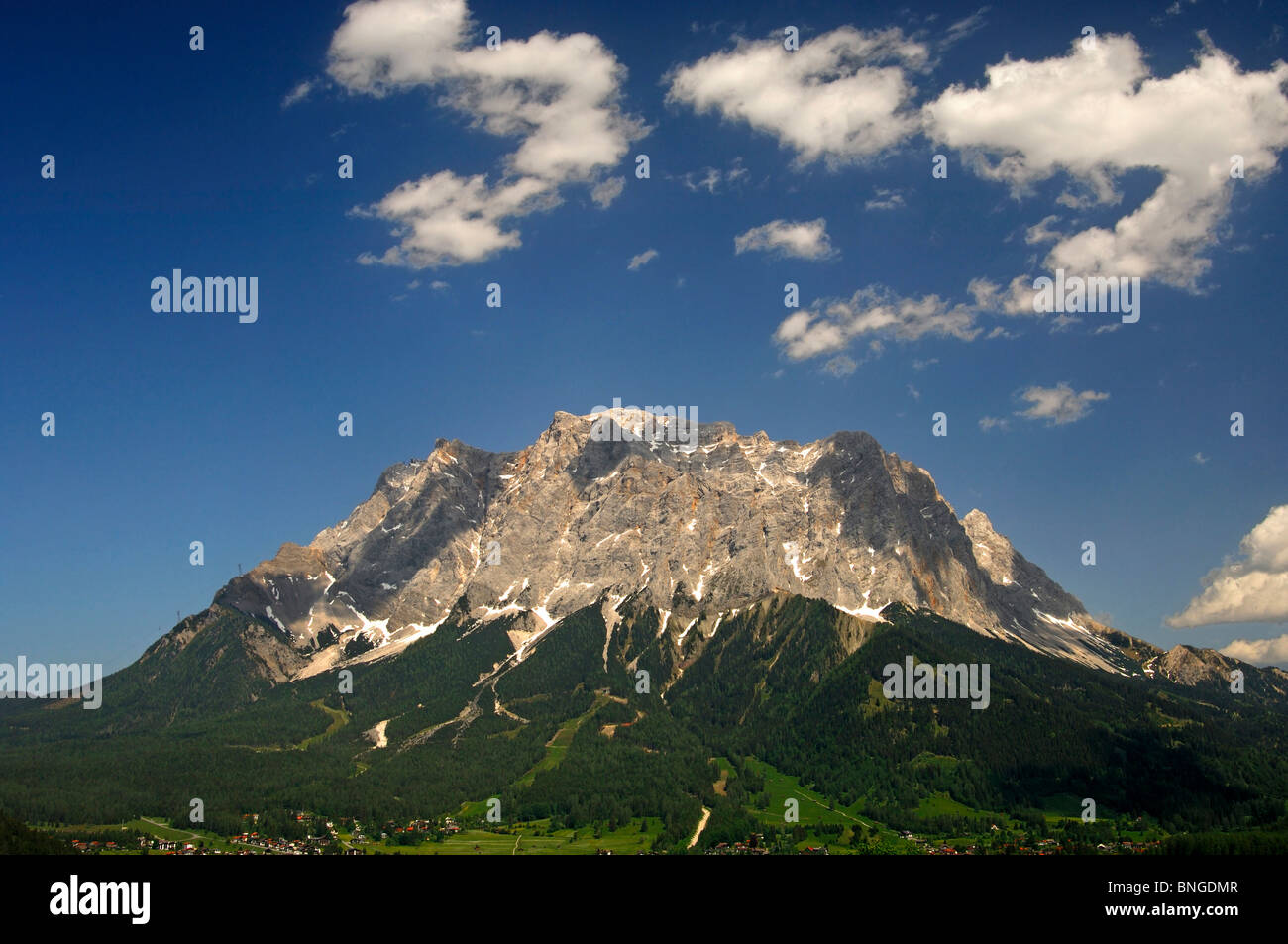 Mt. Zugspitze under a blue summer sky, Ehrwald, Wetterstein mountain range, Tyrol, Austria Stock Photo