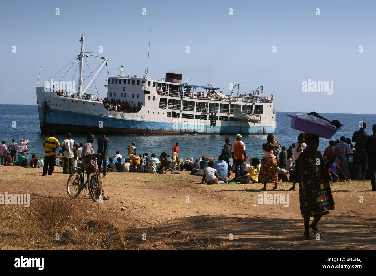 Passengers at Metangula waiting to board the Ilala Ferry, Lake Niassa (Mozambican side of lake Malawi) Mozambique. Stock Photo