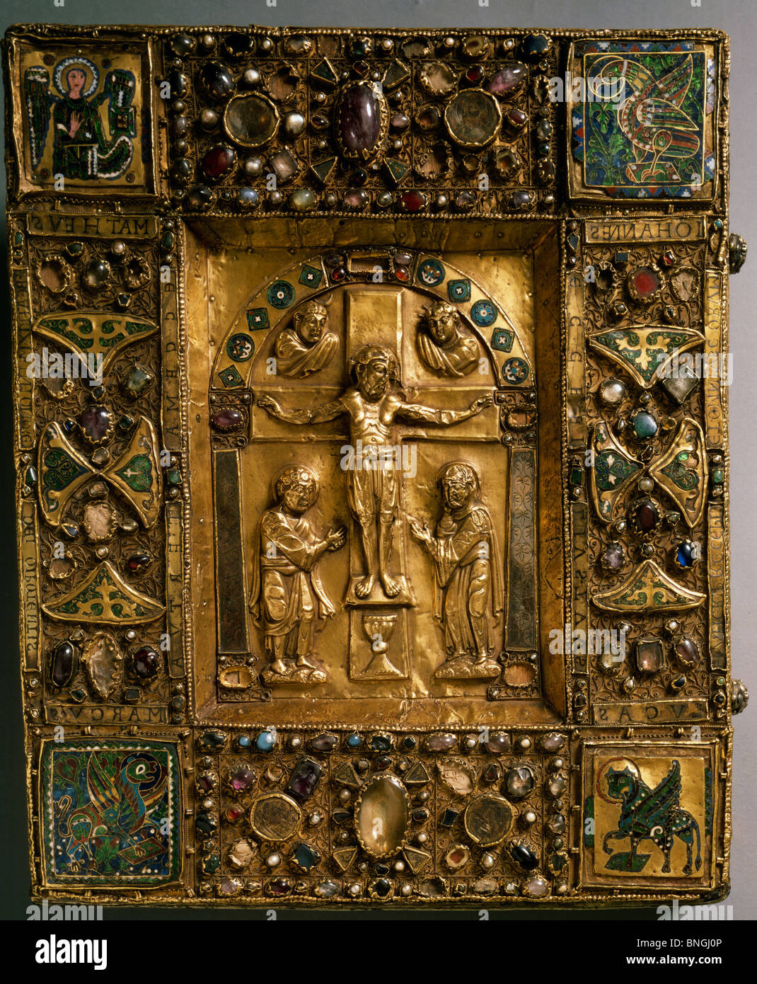 Manuscript Cover with Crucifixion and Evangelist Symbols by unknown artist Stock Photo